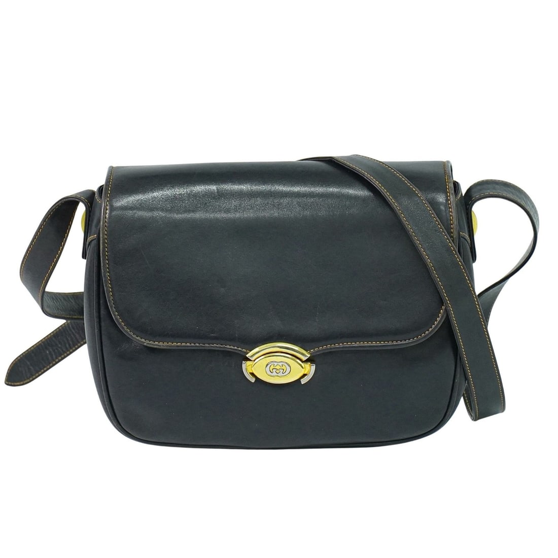 Gucci Vintage Navy Leather Shoulder Bag: Gucci Vintage Navy Leather Shoulder Bag This Gucci vintage shoulder bag is crafted from navy leather and designed for women. It features a classic silhouette with a shoulder strap, made in Italy. The 