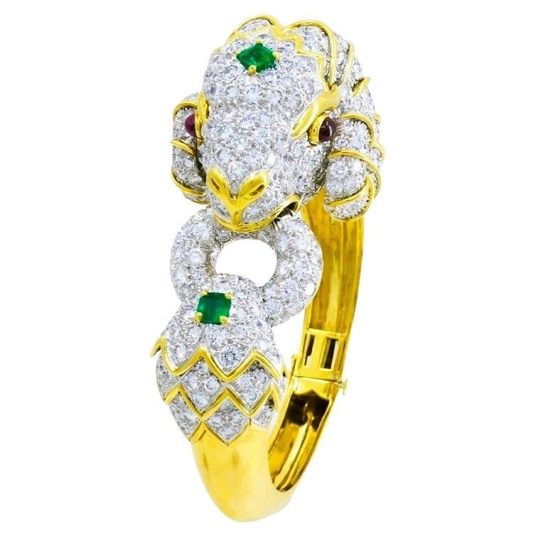 David Webb Kingdom Ram Head Bracelet 18K Gold Platinum Diamond Emerald Ruby: David Webb Kingdom Ram Head Bracelet 18K Gold Platinum Diamond Emerald Ruby Vintage David Webb Kingdom Collection bracelet in 18k yellow gold and platinum, featuring a sculptural ram head design with 