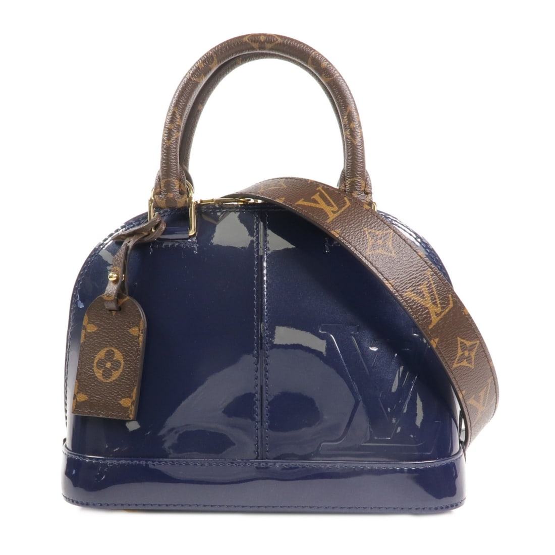 Louis Vuitton Alma BB M54705 Monogram Vernis 2 Way Bag Navy: Louis Vuitton Alma BB M54705 Monogram Vernis 2 Way Bag Navy A Louis Vuitton Alma BB 2-way shoulder bag in navy Monogram Vernis with a structured silhouette and gold-tone hardware. It is made from PVC 