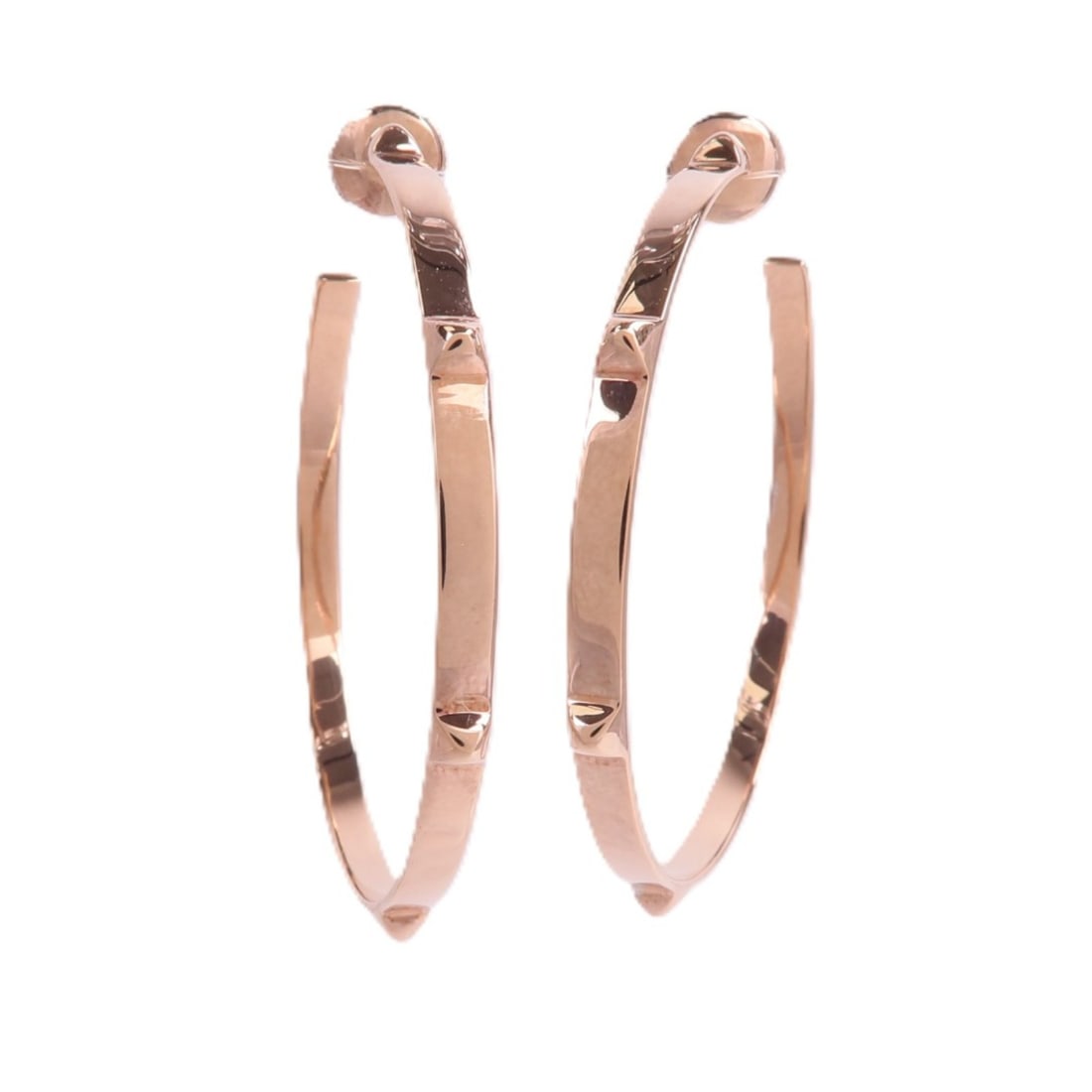 Hermes Mini Clous pierced hoop earrings in 18K rose gold: Hermes Mini Clous pierced hoop earrings in 18K rose gold Hermes Mini Clous hoop earrings in 18K pink gold with a pierced design. Made in France, this pair is presented without stones and comes with no