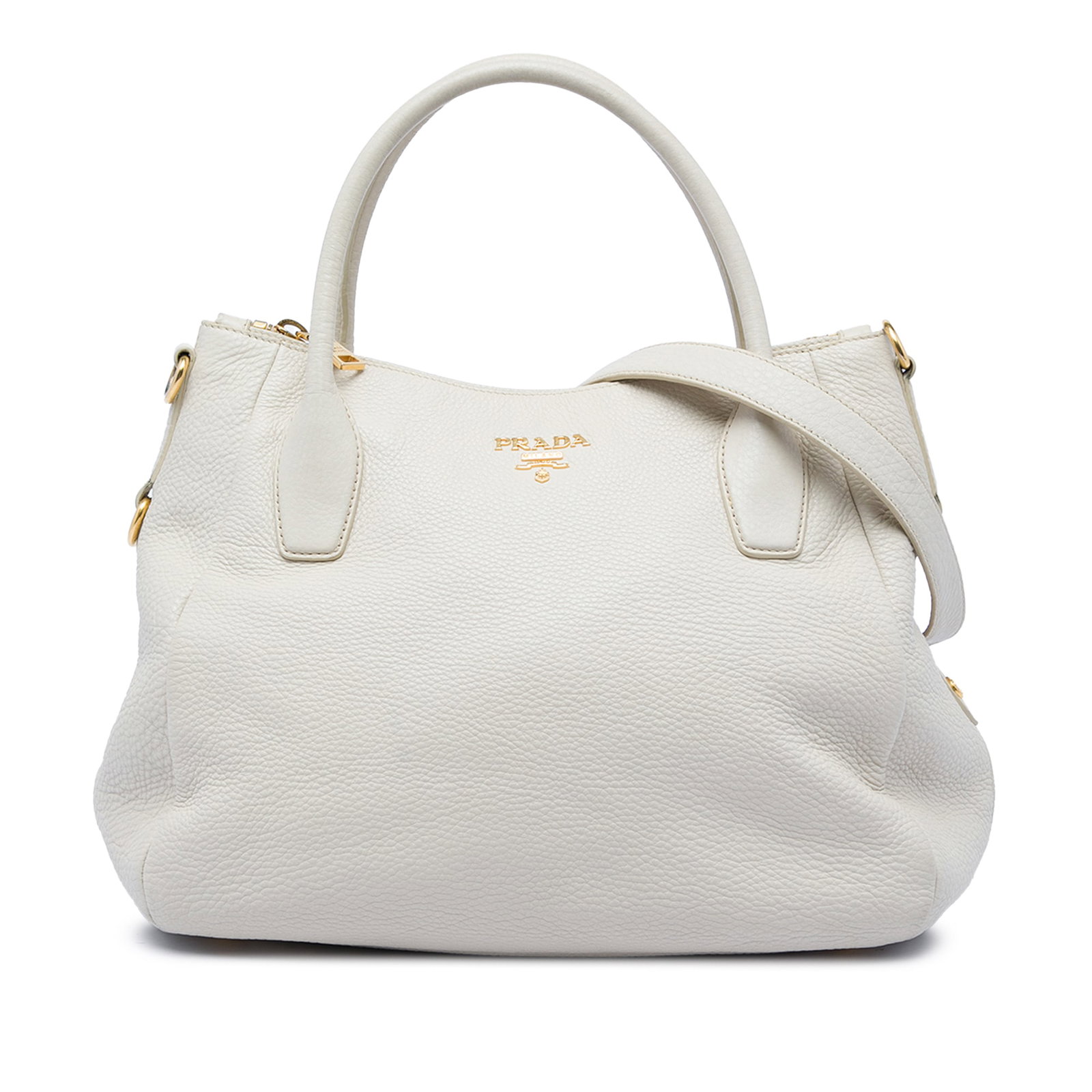 Prada Vitello Daino Leather Satchel with Strap Gray: Prada Vitello Daino Leather Satchel with Strap Gray Prada Vitello Daino Zip Top Convertible Tote in gray leather with a structured satchel silhouette. This bag features rolled leather handles, a detac