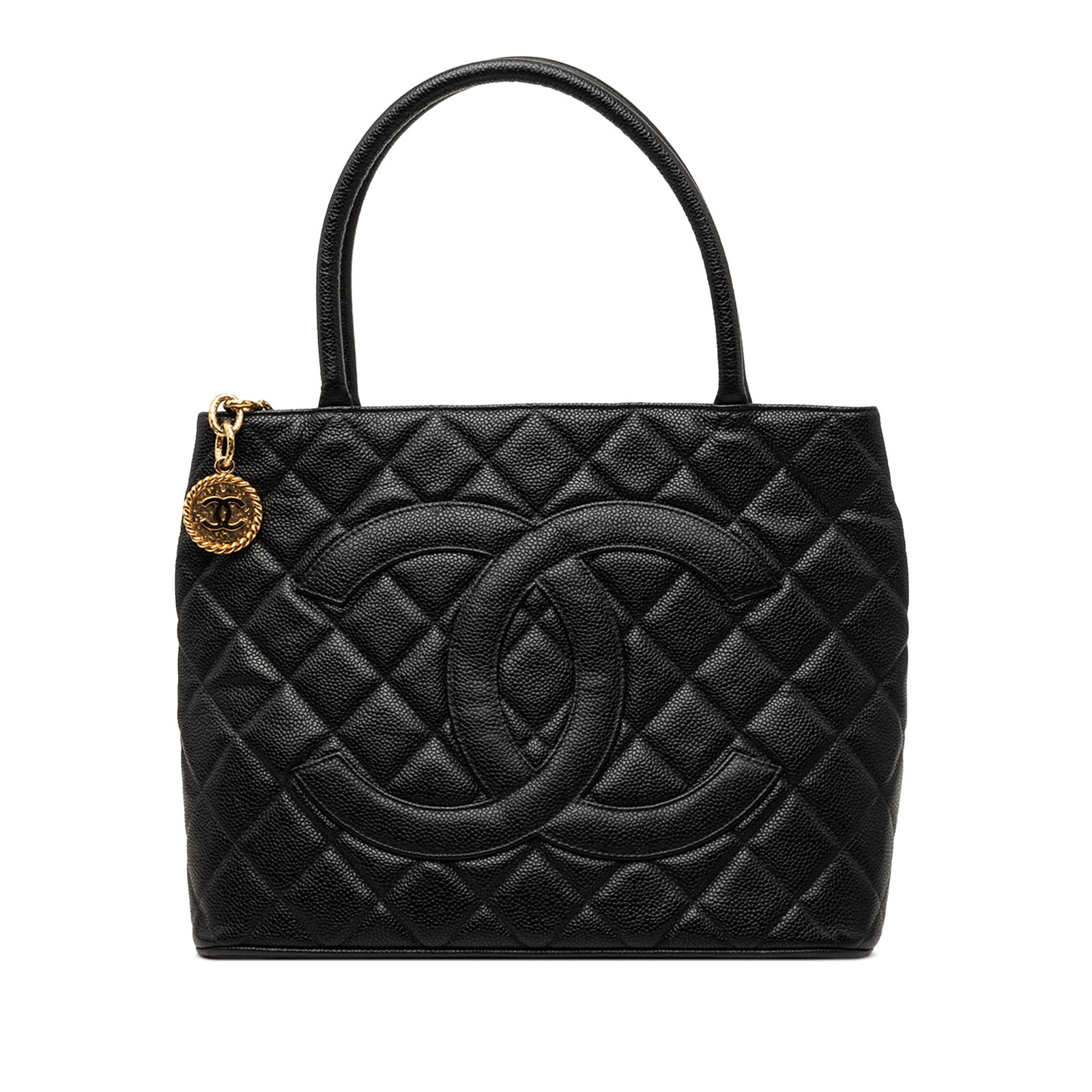 Chanel Medallion Tote Black Caviar Leather Handbag: Chanel Medallion Tote Black Caviar Leather Handbag Chanel Medallion tote crafted in quilted caviar leather with rolled leather handles and a top zip closure. The bag includes an exterior back slip poc