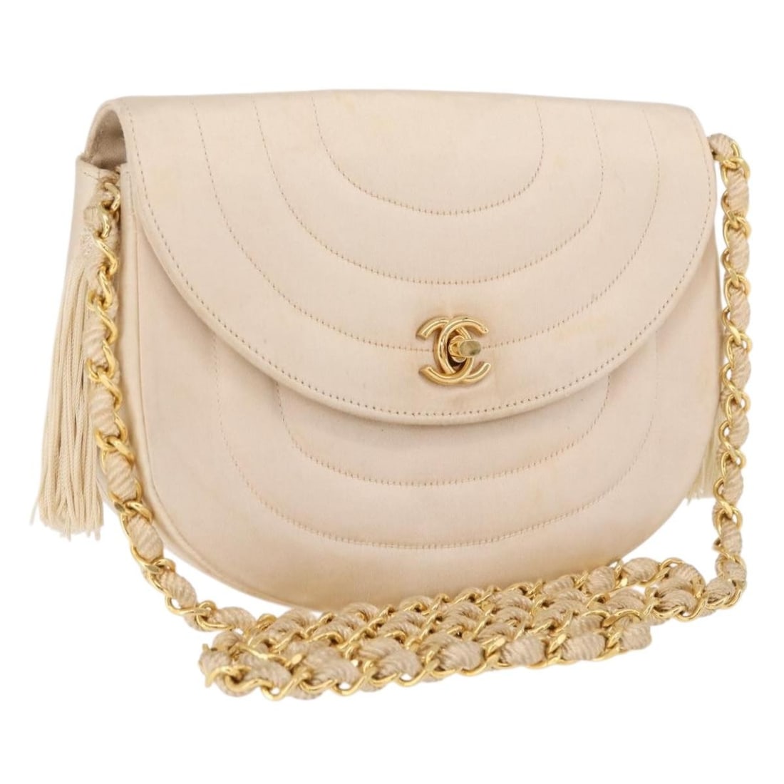 Chanel Vintage Round Flap Beige Satin Shoulder Bag: Chanel Vintage Round Flap Beige Satin Shoulder Bag A vintage Chanel Round Flap bag in beige satin, made in France. It measures 19 cm x 15 cm x 6 cm and is described as being in good condition with lig
