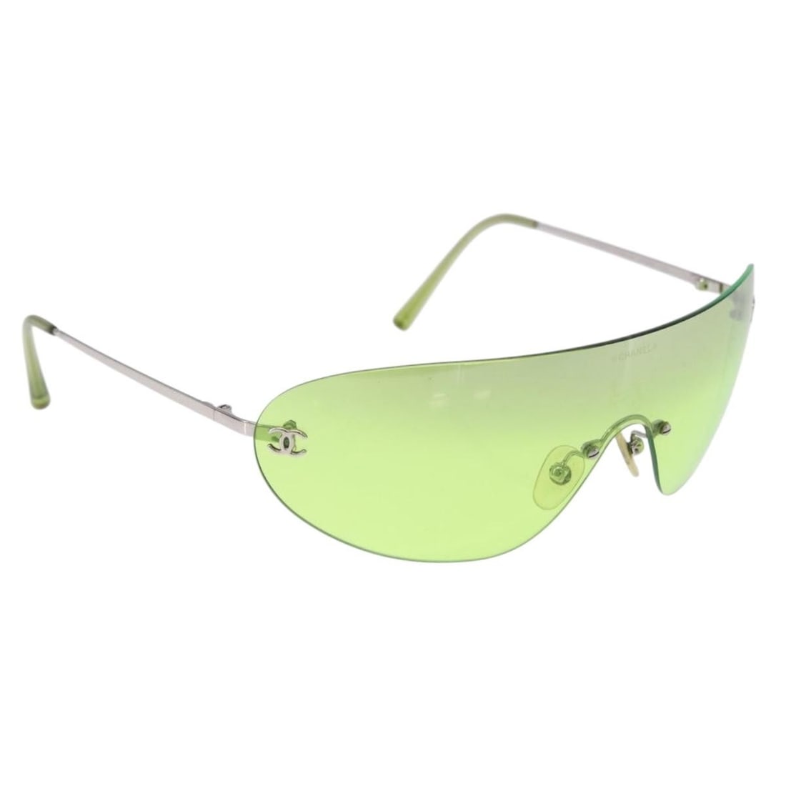 CHANEL metal rimless sunglasses in green silver with case: CHANEL metal rimless sunglasses in green silver with case Authentic CHANEL rimless sunglasses in green and silver-tone metal. Made in Italy, this women's style includes a sunglass case. Condition is r