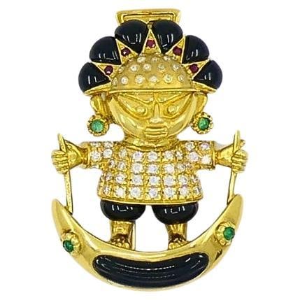 Cartier Aldo Cipullo 18k Gold Warrior Brooch with Onyx Diamond Ruby Emerald: Cartier Aldo Cipullo 18k Gold Warrior Brooch with Onyx Diamond Ruby Emerald An Aldo Cipullo for Cartier brooch crafted in 18k gold, featuring onyx, diamond, emerald, and ruby. The design depicts a war