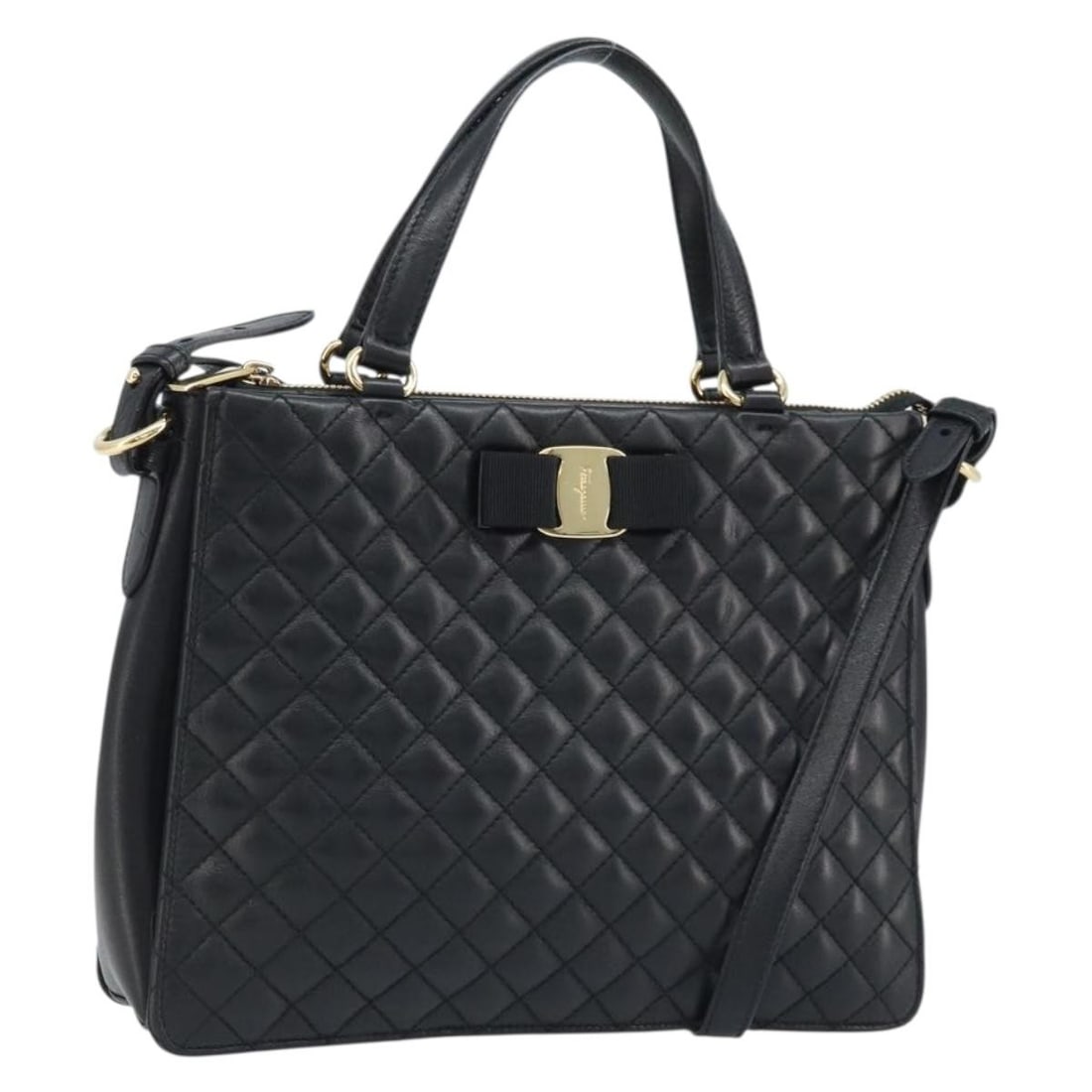 Salvatore Ferragamo Vala Black Leather Two Way Handbag with Gold Hardware: Salvatore Ferragamo Vala Black Leather Two Way Handbag with Gold Hardware This Salvatore Ferragamo Vala handbag features a classic black leather exterior with gold-tone accents and can be carried by h