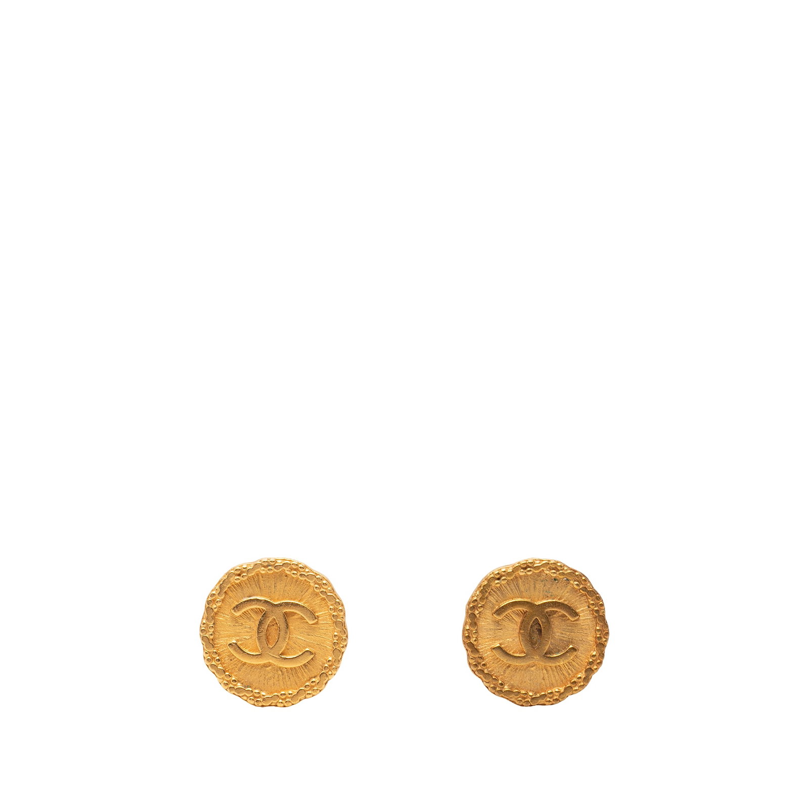Chanel CC gold tone round clip on earrings: Chanel CC gold tone round clip on earrings These Chanel CC round clip-on earrings are crafted from gold tone metal and feature the iconic CC logo. Designed with clip-on closures, they offer a classic 