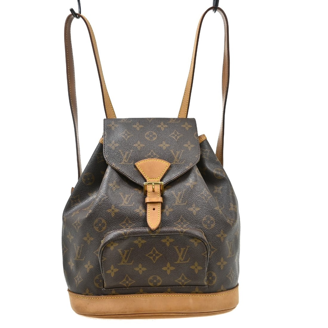 Louis Vuitton Montsouris MM Monogram Canvas Backpack M51136: Louis Vuitton Montsouris MM Monogram Canvas Backpack M51136 Vintage Louis Vuitton Montsouris MM backpack bag in brown Monogram canvas with leather trim. This medium backpack features a flap buckle and