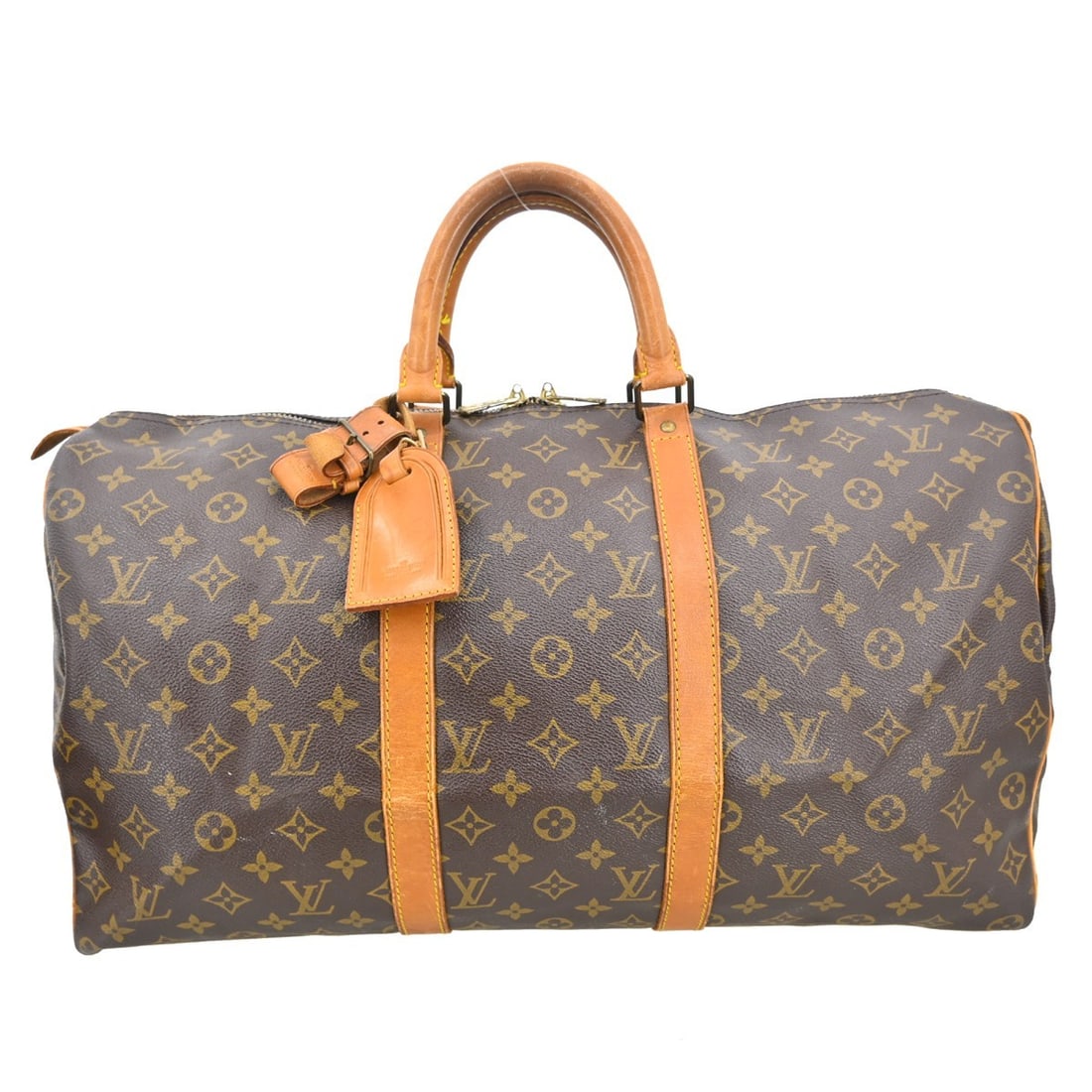 Louis Vuitton Keepall unisex brown monogram canvas bag: Louis Vuitton Keepall unisex brown monogram canvas bag Louis Vuitton Keepall in Monogram canvas with a unisex design and brown colorway. This travel bag is made in France and remains a classic silhoue