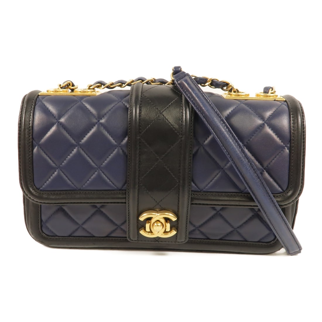 CHANEL Elegant CC Flap Shoulder Bag Black Navy Lambskin: CHANEL Elegant CC Flap Shoulder Bag Black Navy Lambskin Elegant CC flap shoulder bag in black and navy lambskin leather. This women's shoulder bag features an exterior open pocket and an interior zip 