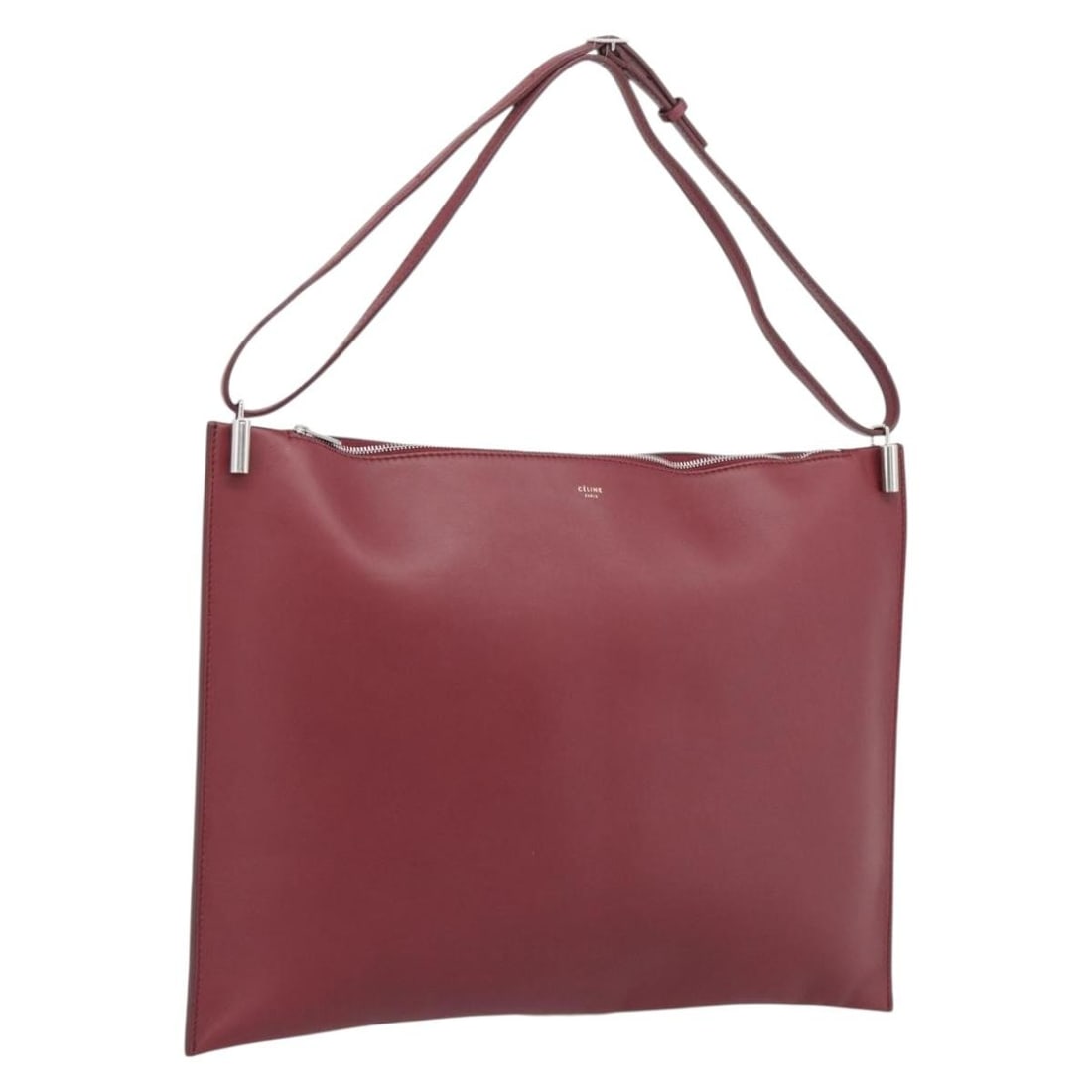 CELINE Bordeaux Leather Shoulder Bag with Silver Tone Hardware: CELINE Bordeaux Leather Shoulder Bag with Silver Tone Hardware Authentic CELINE shoulder bag in bordeaux leather with silver-tone accents. Made in Italy, this women's bag has a slim profile and a sing