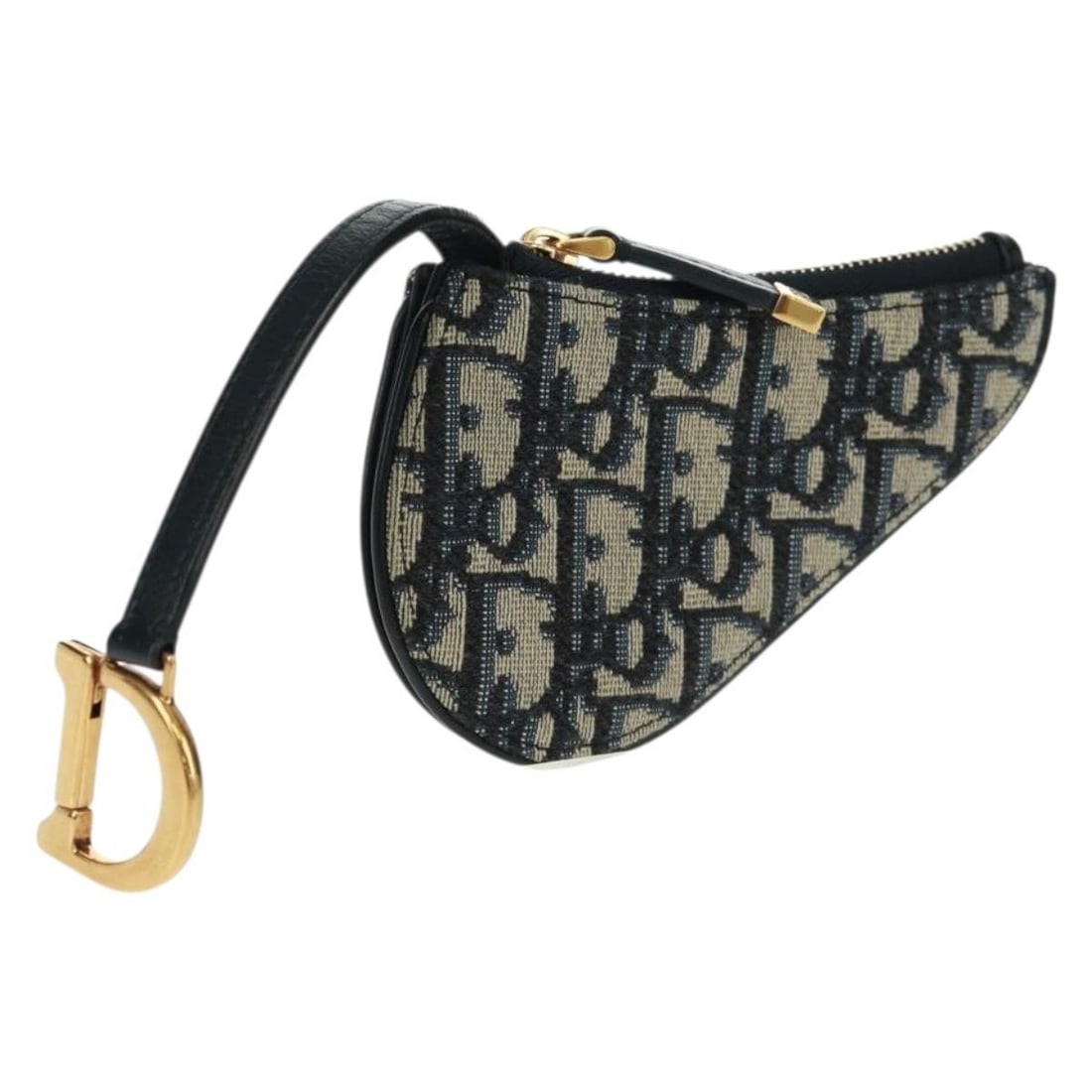 Christian Dior Saddle Pouch in Navy Gold Trotter Canvas: Christian Dior Saddle Pouch in Navy Gold Trotter Canvas Christian Dior saddle pouch in navy and gold Trotter canvas. Made in Italy, this women's pouch includes the item box. Condition is AB / very goo