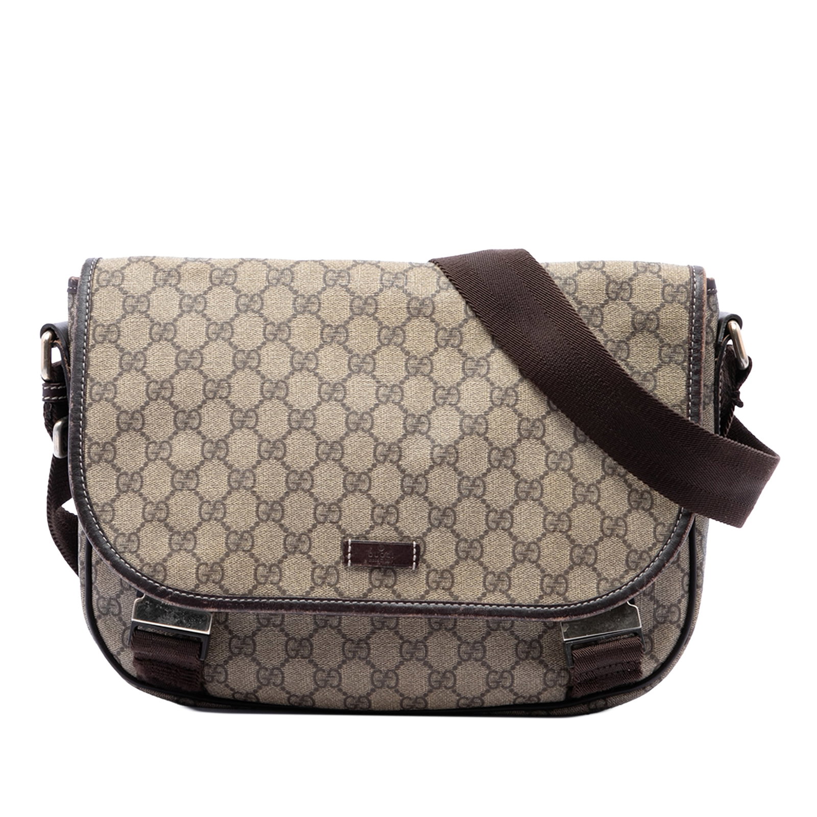 Gucci GG Supreme messenger bag coated canvas leather trim: Gucci GG Supreme messenger bag coated canvas leather trim Gucci GG Supreme Crossbody messenger bag in beige with a coated canvas body and leather trim. It features a flat adjustable strap, a top flap 