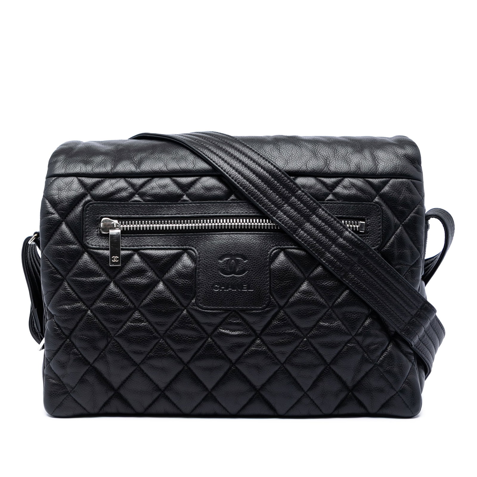 Chanel Coco Cocoon quilted caviar leather crossbody messenger bag: Chanel Coco Cocoon quilted caviar leather crossbody messenger bag Large Chanel Coco Cocoon messenger bag in black quilted caviar leather. This crossbody style features an adjustable flat leather strap