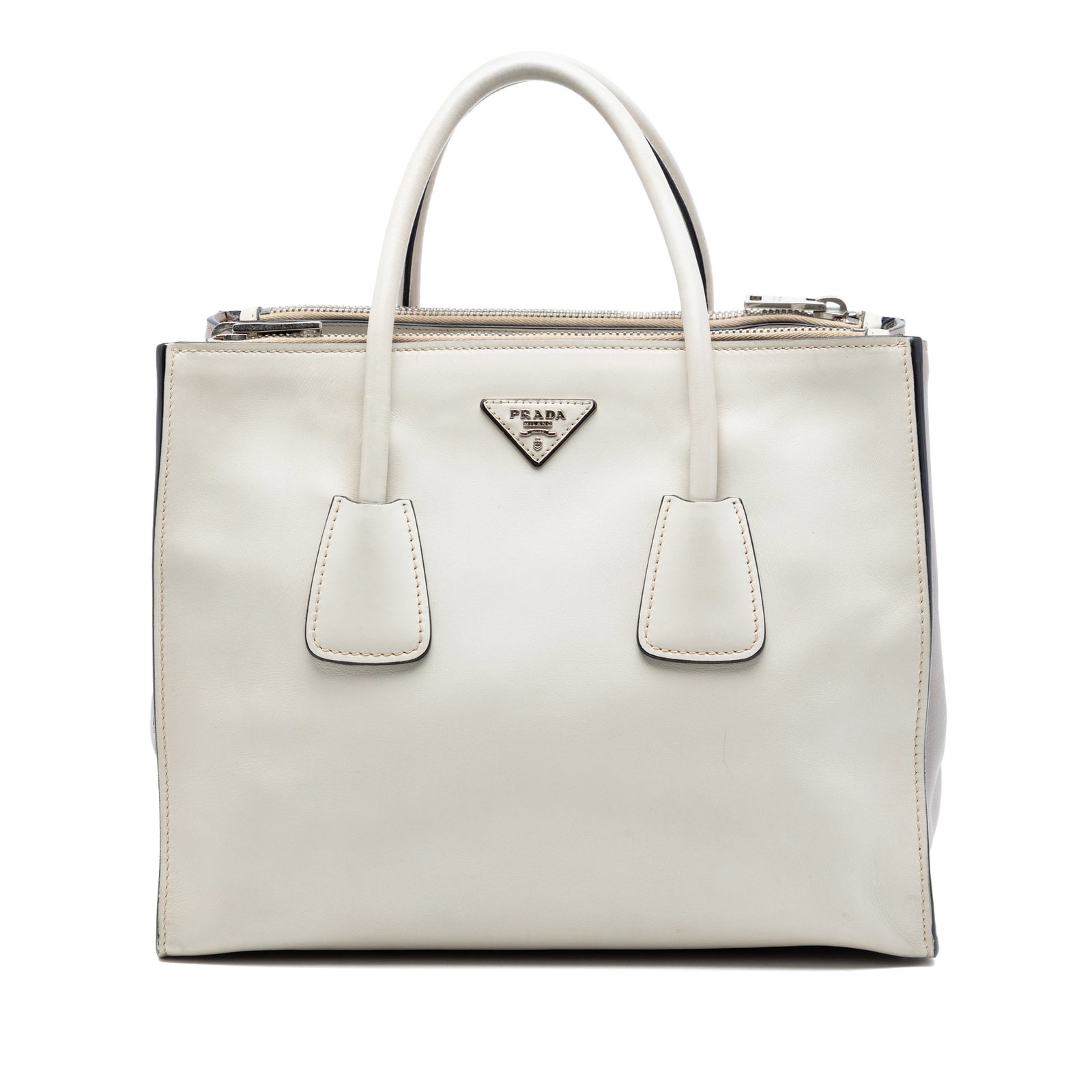 Prada Glace Calf Leather Satchel Twin Pocket Double Handle White: Prada Glace Calf Leather Satchel Twin Pocket Double Handle White Prada Glace Calf Twin Pocket Double Handle Satchel in white leather. This satchel features rolled leather handles, an open top with a m