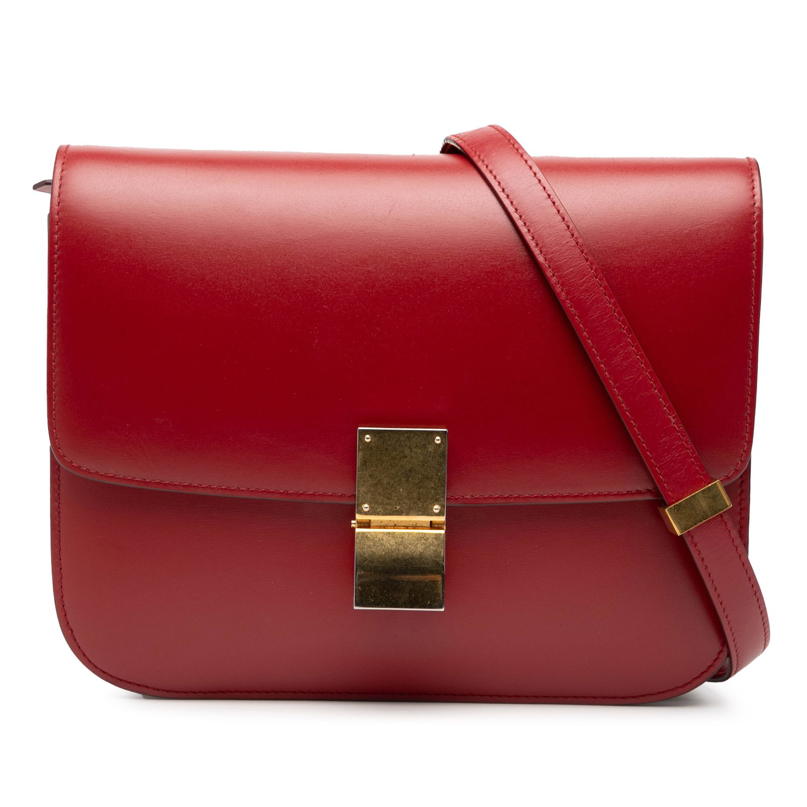 Celine Classic Box Medium Red Leather Crossbody Bag with Flap and Metal Clasp: Celine Classic Box Medium Red Leather Crossbody Bag with Flap and Metal Clasp This Celine Medium Calfskin Classic Box crossbody bag features a red leather body with an adjustable flat leather strap, a