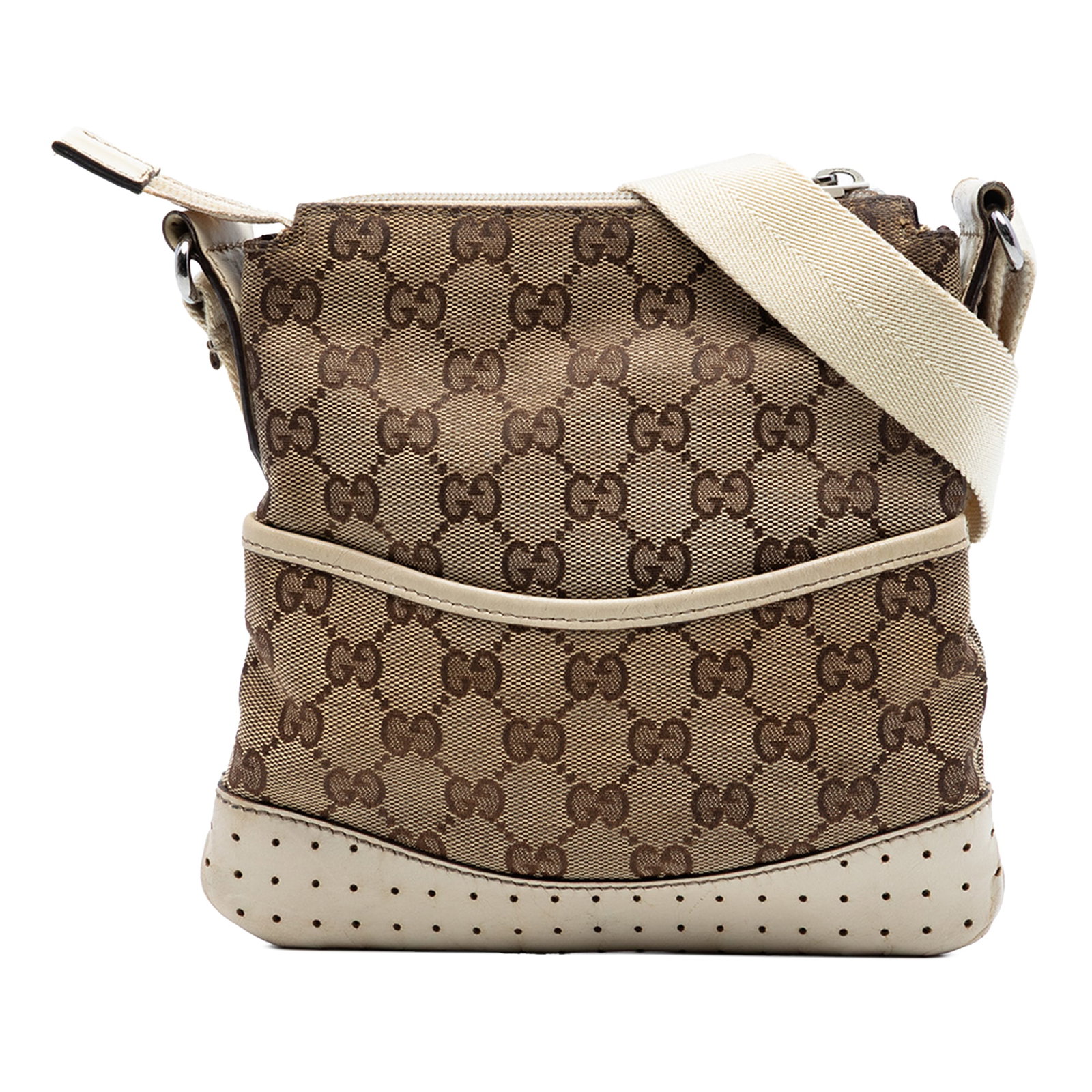 Gucci beige perforated leather trim crossbody bag: Gucci beige perforated leather trim crossbody bag This Gucci Small GG Canvas Perforated Crossbody bag features a beige canvas body with perforated leather trim, an adjustable flat strap, a top zip clo