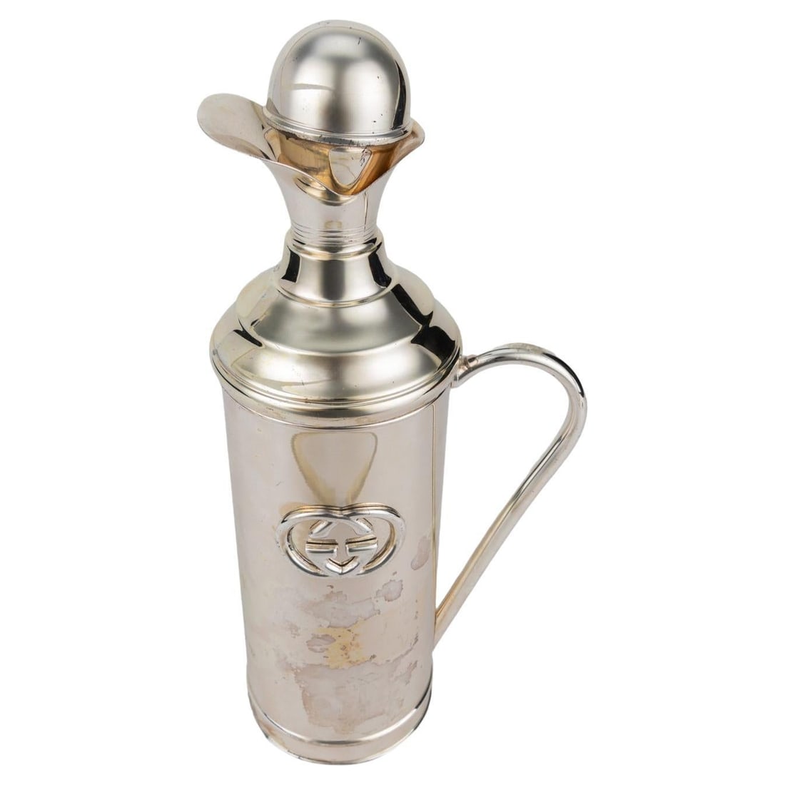 Gucci Vintage 80s Insulated Thermos with GG Logo: Gucci Vintage 80s Insulated Thermos with GG Logo This vintage Gucci insulated thermos is a stylish blend of functionality and luxury, ideal for collectors and enthusiasts alike. Crafted from silver to