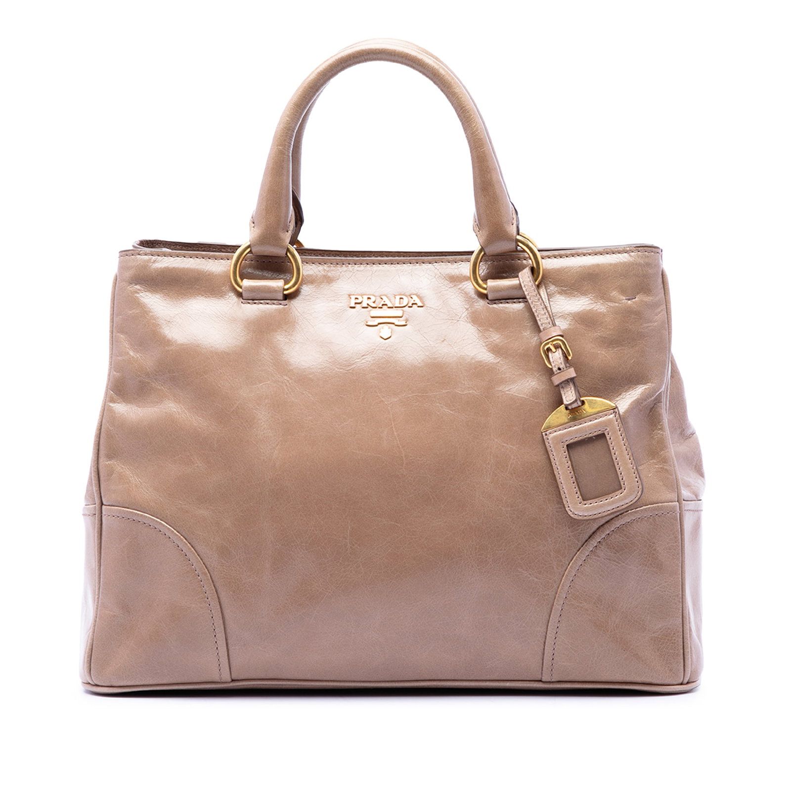 Prada Vitello Shine Brown Leather Zip Satchel Bag: Prada Vitello Shine Brown Leather Zip Satchel Bag Brown Prada Vitello Shine Satchel in leather with rolled leather handles, a top zip closure, and an interior zip pocket. Origin: Turkey. Includes 1 du