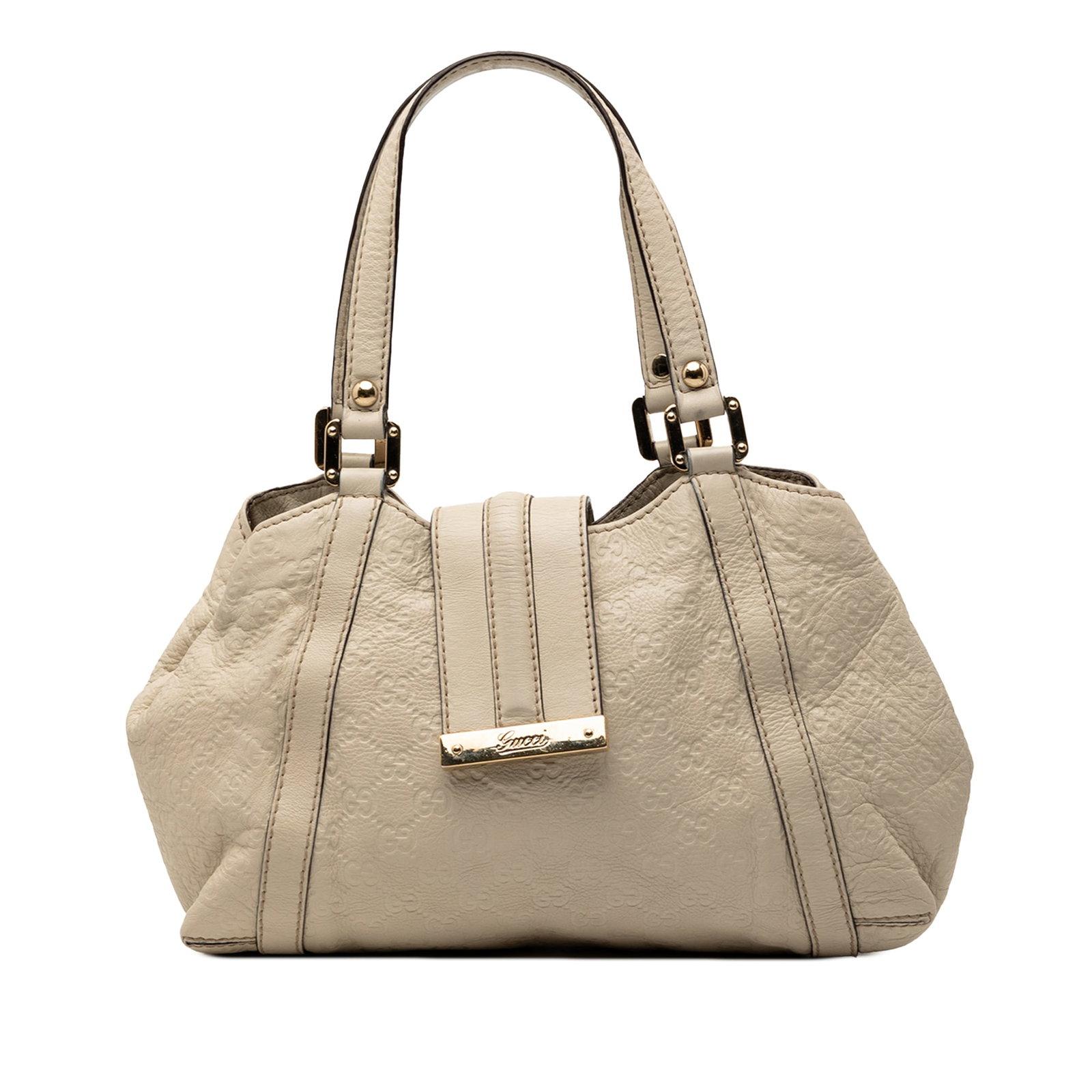 Gucci Guccissima white leather tote with magnetic snap closure: Gucci Guccissima white leather tote with magnetic snap closure This Guccissima New Ladies Tote features an embossed leather body in white, flat leather handles, and an open top with a top strap and ma
