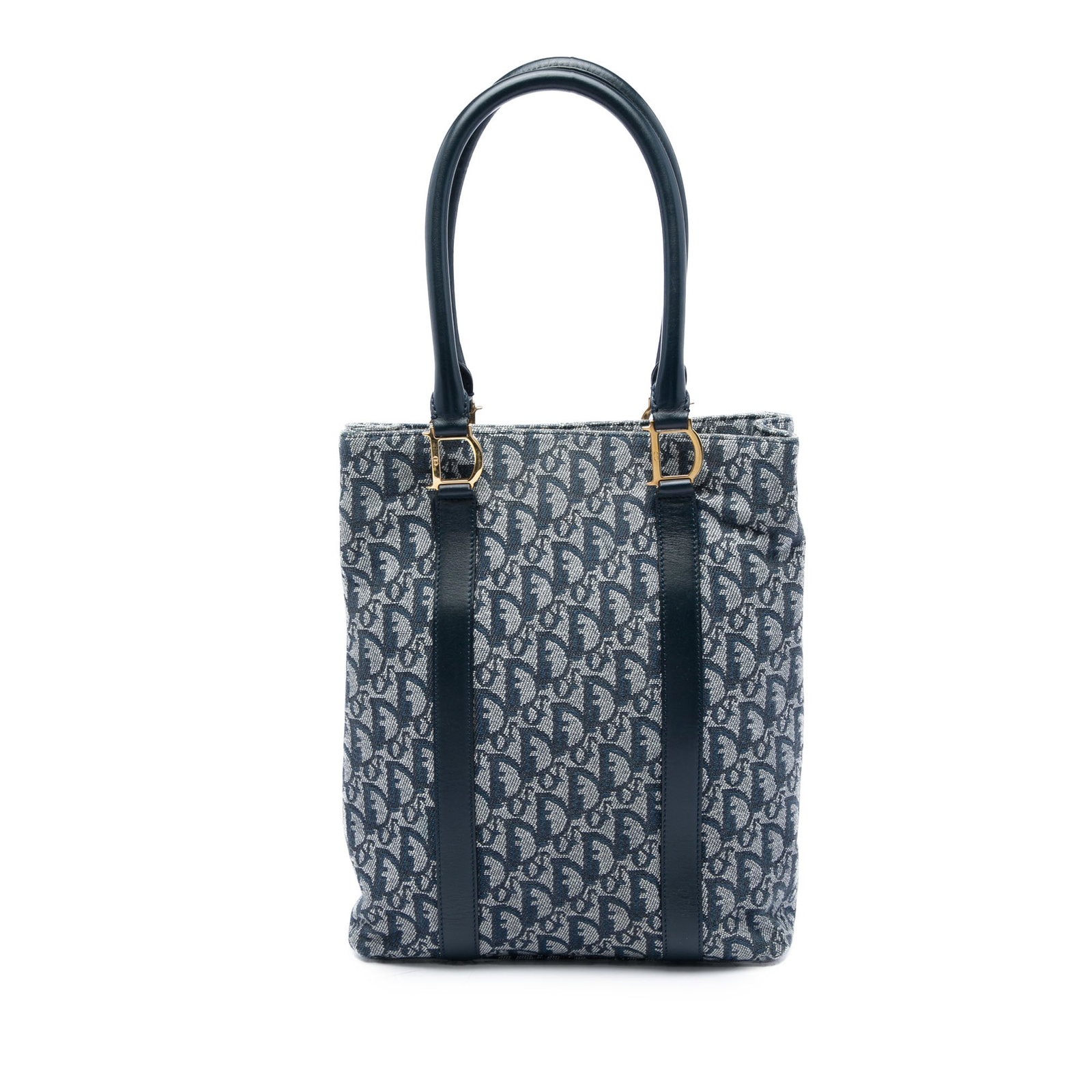 Dior Diorissimo Trotter blue canvas tote with leather trim: Dior Diorissimo Trotter blue canvas tote with leather trim Diorissimo Trotter tote bag with a canvas body and leather trim. It features rolled leather handles, an open top with magnetic snap closure, 