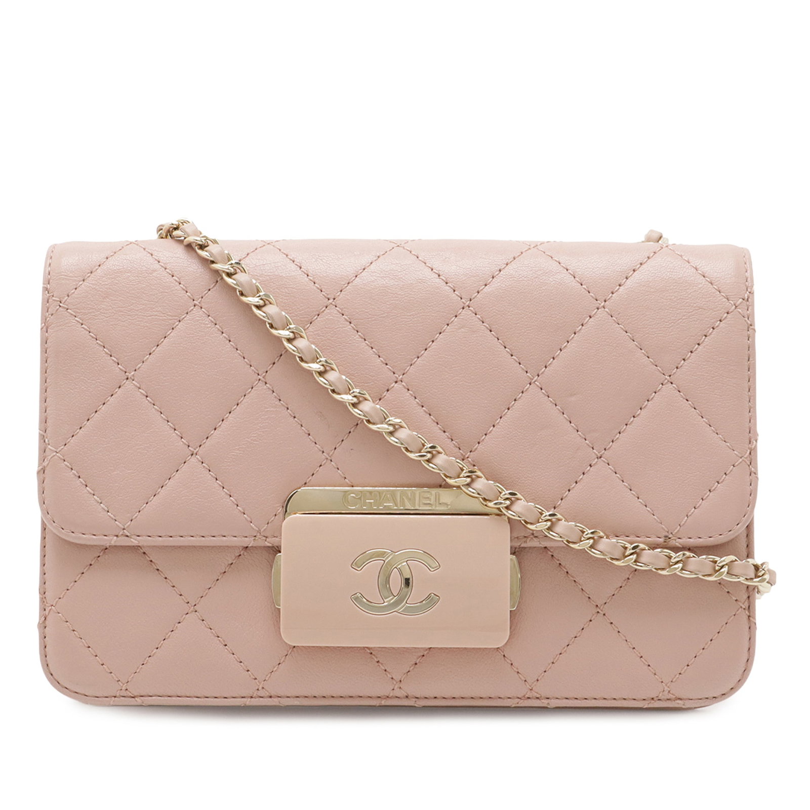 Chanel Beauty Lock Flap Mini Crossbody in Pink Quilted Sheepskin: Chanel Beauty Lock Flap Mini Crossbody in Pink Quilted Sheepskin Mini quilted sheepskin leather crossbody bag with a front flap and push lock closure. The design includes a leather-woven chain link st