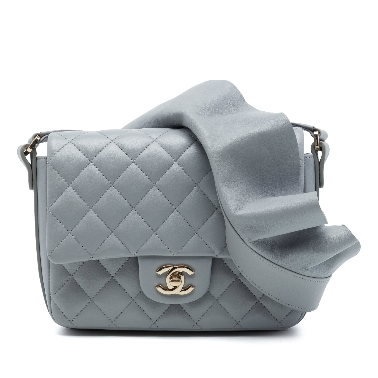 Chanel Bolero de Chanel Quilted Calfskin Gray Flap Bag: Chanel Bolero de Chanel Quilted Calfskin Gray Flap Bag Chanel Quilted Calfskin Bolero de Chanel Flap bag in gray leather. This flap bag features a quilted leather body, a flat leather strap, a front f