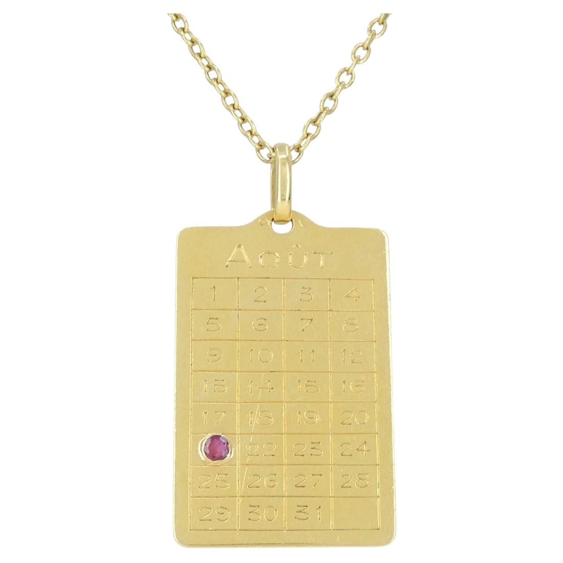French 18k Gold August Calendar Pendant Necklace with Ruby: French 18k Gold August Calendar Pendant Necklace with Ruby Late 20th century French 18k yellow gold calendar pendant necklace featuring a rectangular pendant designed as a calendar page for Aout, the 