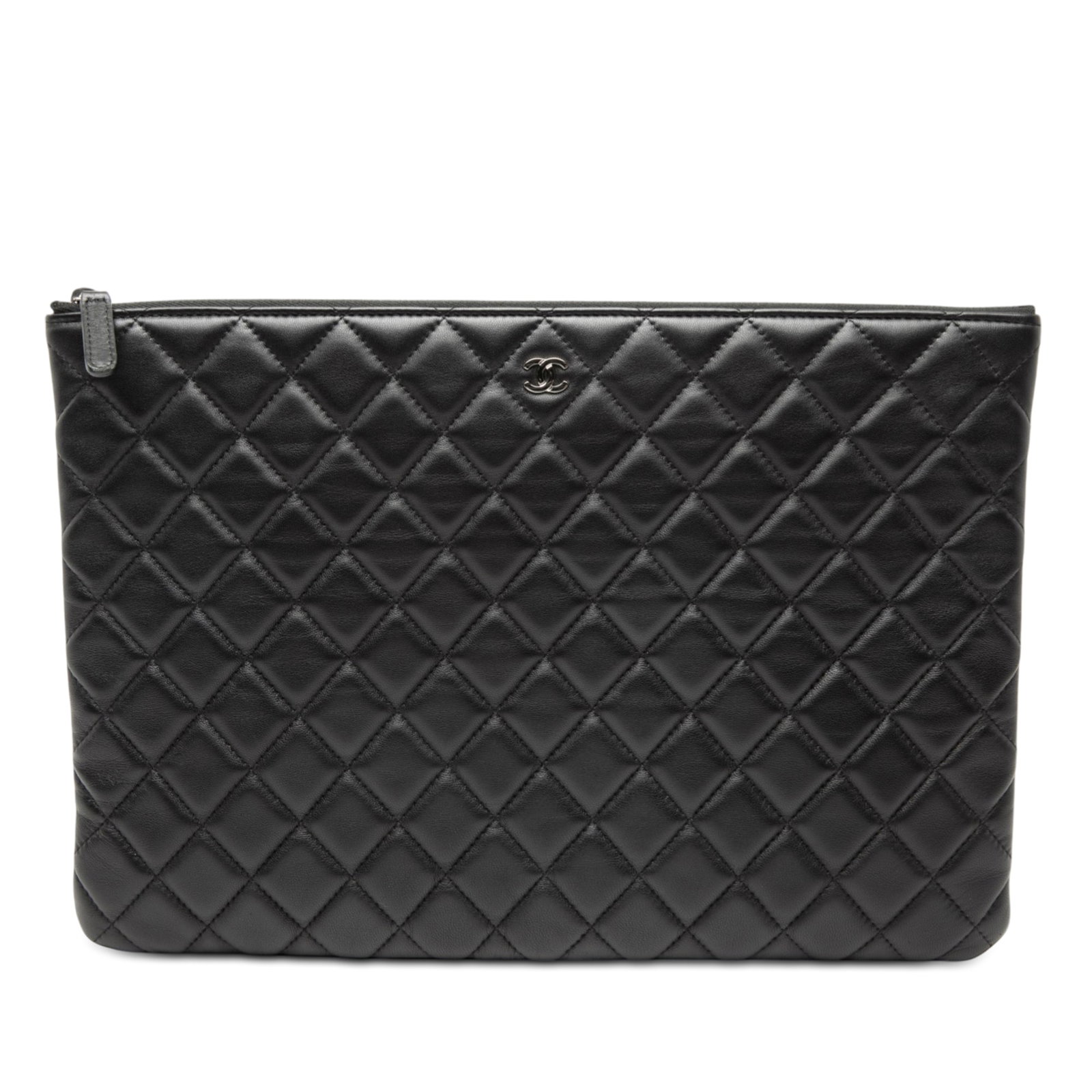 Black Quilted Lambskin O Case Clutch by Chanel with Top Zip: Black Quilted Lambskin O Case Clutch by Chanel with Top Zip This Chanel Large Quilted Lambskin Double Stitch O Case Clutch showcases a quilted lambskin leather body in black and features a top zip clo