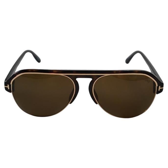 Tom Ford FT0929 Aviator Sunglasses in Dark Havana Tortoise: Tom Ford FT0929 Aviator Sunglasses in Dark Havana Tortoise Tom Ford FT0929 aviator sunglasses in tortoise dark Havana. The frame measures 5.75 in wide, with an opening width of 4.5 in. Described as be