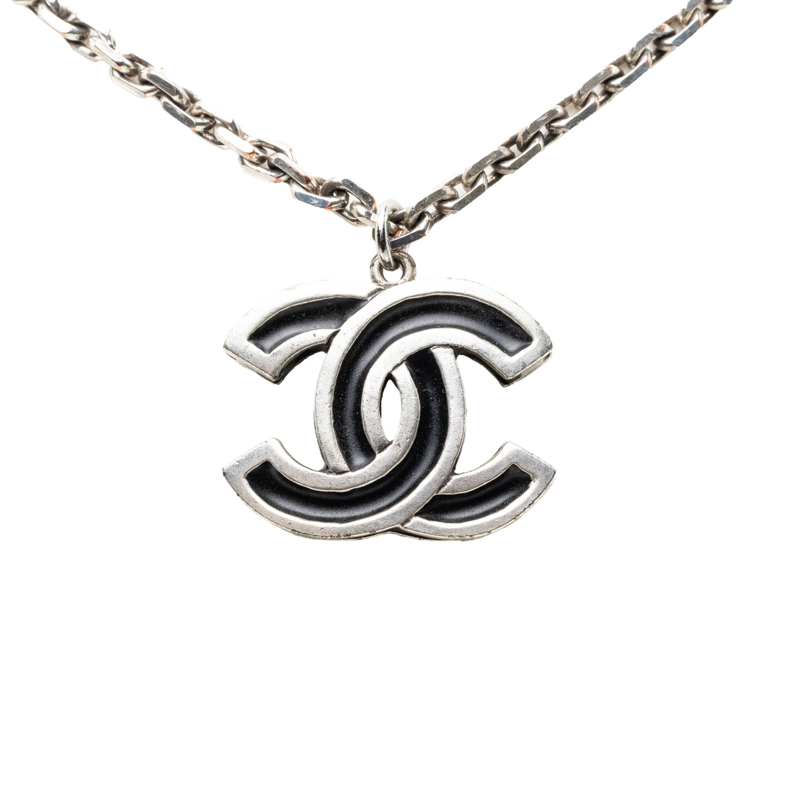 Chanel CC pendant necklace in silver tone metal and enamel: Chanel CC pendant necklace in silver tone metal and enamel Chanel CC pendant necklace in silver-tone metal with enamel detailing. This costume jewelry piece is finished with a lobster clasp closure. C