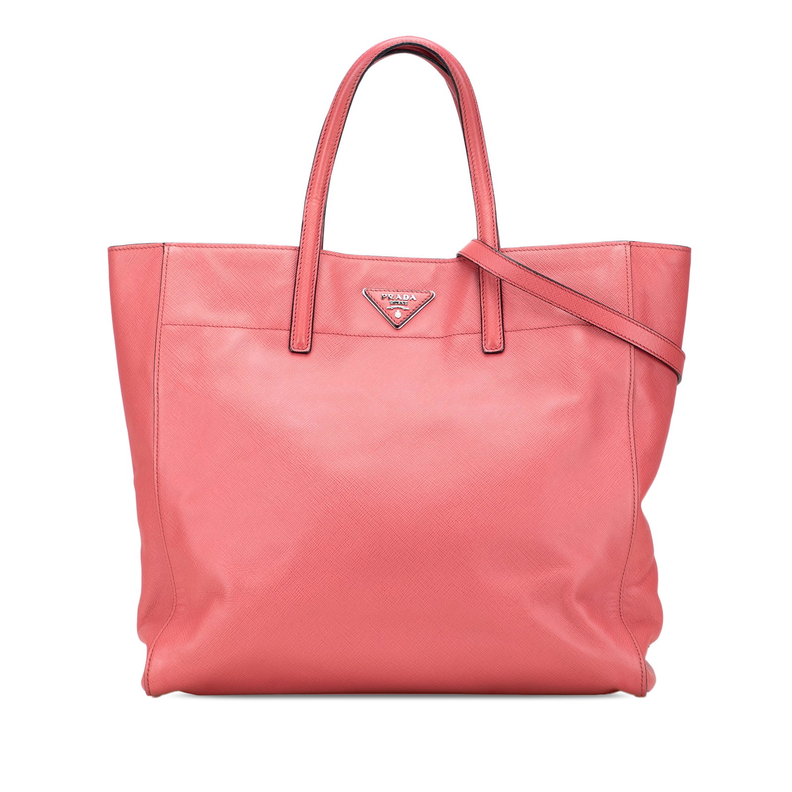 Prada Saffiano Soft Tote Leather Bag in Pink: Prada Saffiano Soft Tote Leather Bag in Pink The Prada Saffiano Soft Tote is a stylish and functional satchel crafted from high-quality leather. This tote features flat leather handles and a detachabl