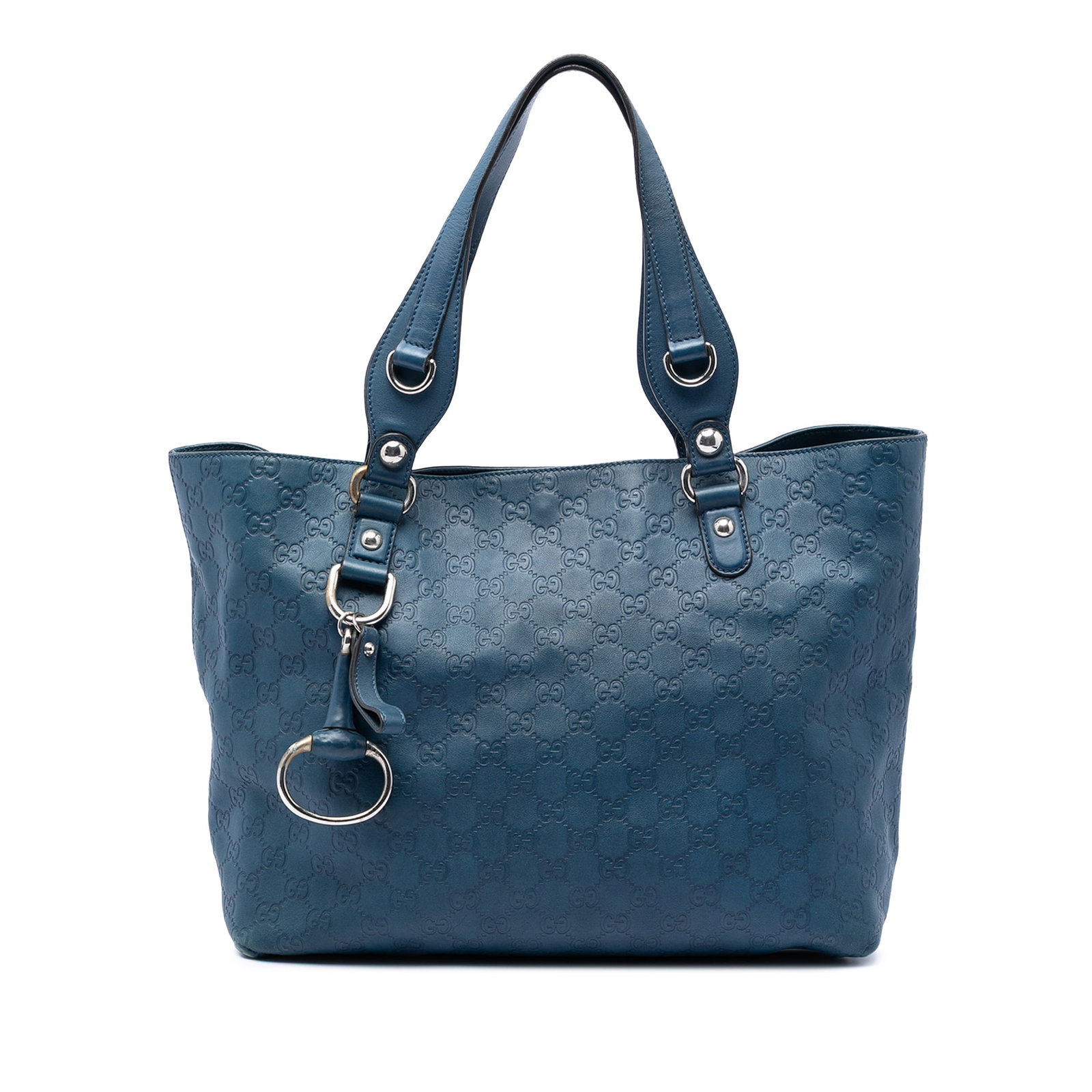 Gucci Guccissima Icon Bit Leather Tote Bag Blue: Gucci Guccissima Icon Bit Leather Tote Bag Blue Guccissima Icon Bit tote bag in blue leather with flat leather handles, an open top with magnetic snap closure, and interior zip and slip pockets. Made 