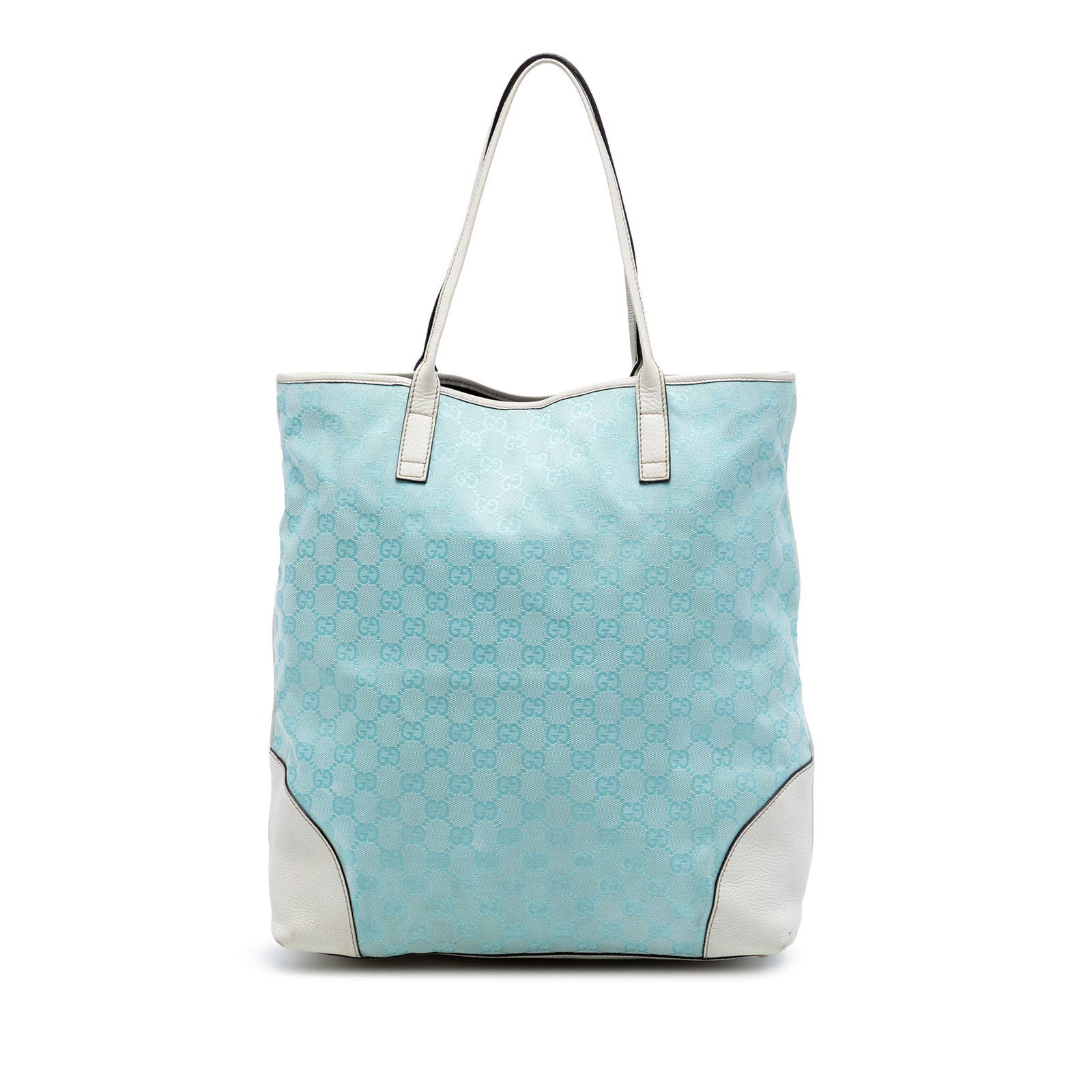 Gucci GG Canvas blue tote bag with leather trim: Gucci GG Canvas blue tote bag with leather trim This Gucci GG Canvas Tote features a durable canvas body with leather trim and flat leather straps. The open top design offers easy access to the spacio