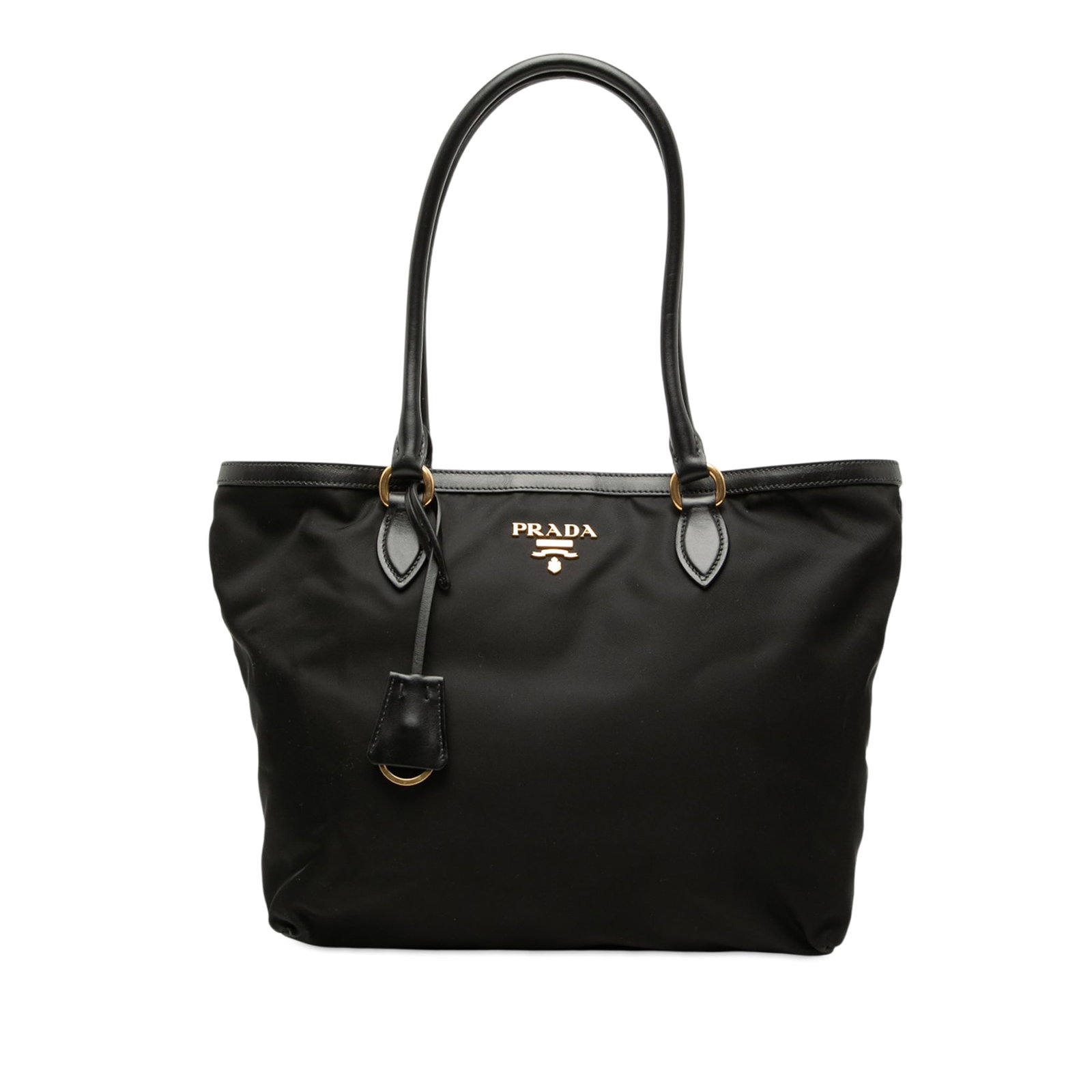 Prada Tessuto nylon tote bag with leather trim black: Prada Tessuto nylon tote bag with leather trim black Prada Tessuto Tote in black with a nylon body, leather trim, and rolled leather handles. The bag features an open top with magnetic snap closure an
