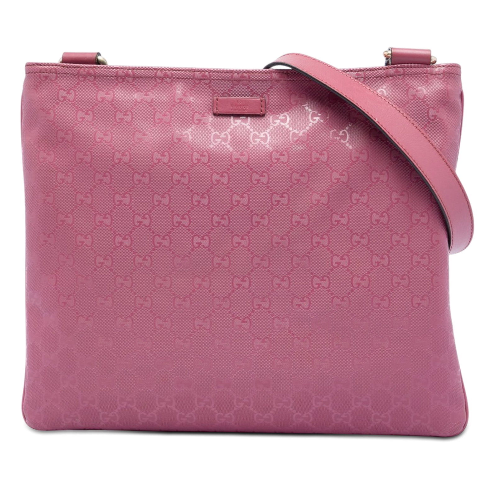 Gucci GG Imprime Pink Coated Canvas Crossbody Bag: Gucci GG Imprime Pink Coated Canvas Crossbody Bag Gucci GG Imprime crossbody bag in pink with a coated canvas body and adjustable flat leather strap. The bag features a top zip closure, along with int