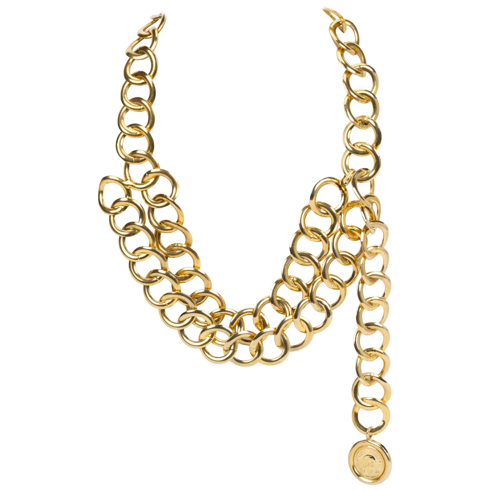 Chanel double chain belt necklace gold plated with Coco head charm: Chanel double chain belt necklace gold plated with Coco head charm Chanel oversize double chain belt/necklace featuring a Coco head charm dangle. A versatile vintage accessory from the 1980s, presente