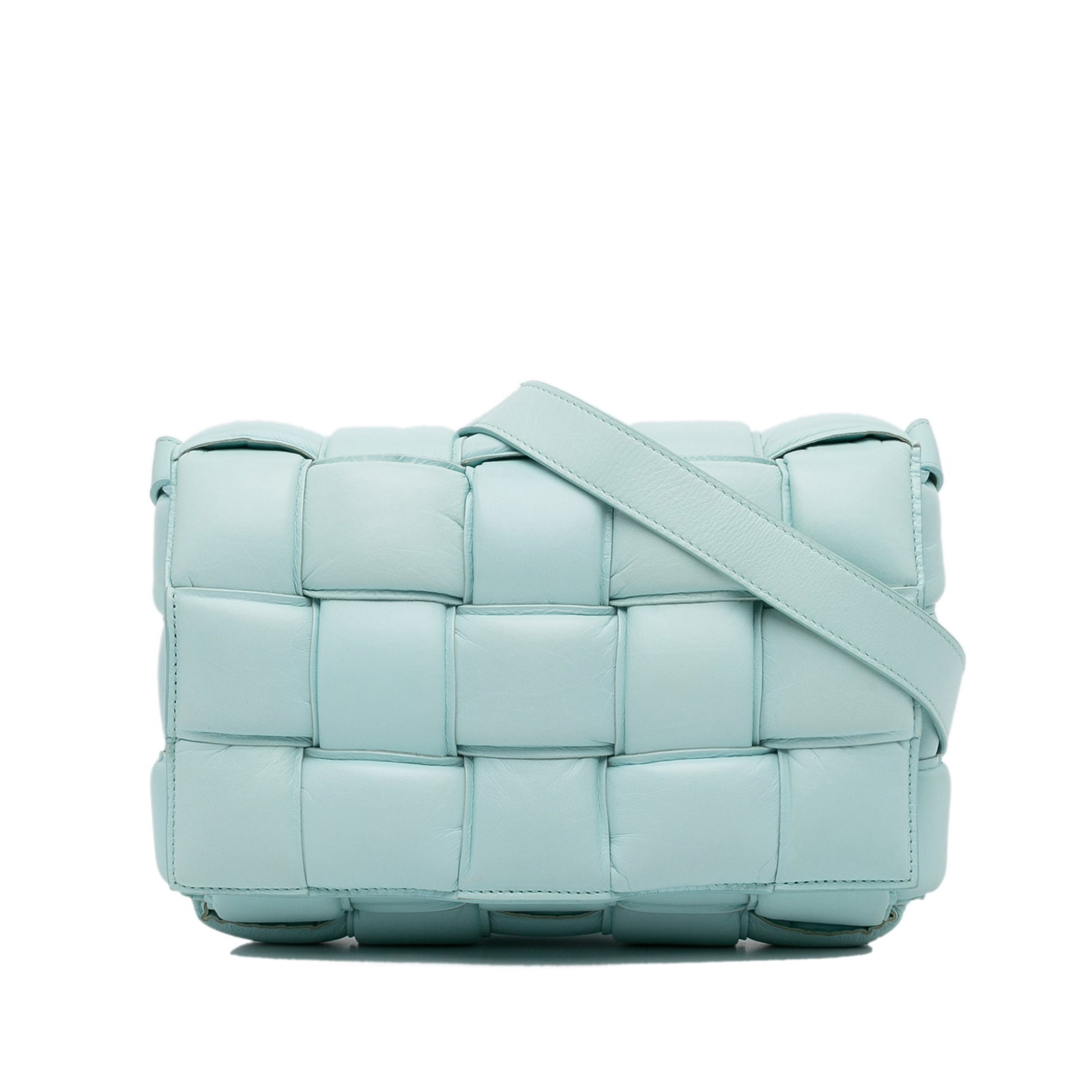 Bottega Veneta Blue Nappa Intrecciato Padded Cassette Crossbody Bag: Bottega Veneta Blue Nappa Intrecciato Padded Cassette Crossbody Bag Introducing the Bottega Veneta Nappa Intrecciato Padded Cassette Crossbody, a stunning blend of luxury and functionality. This exqui