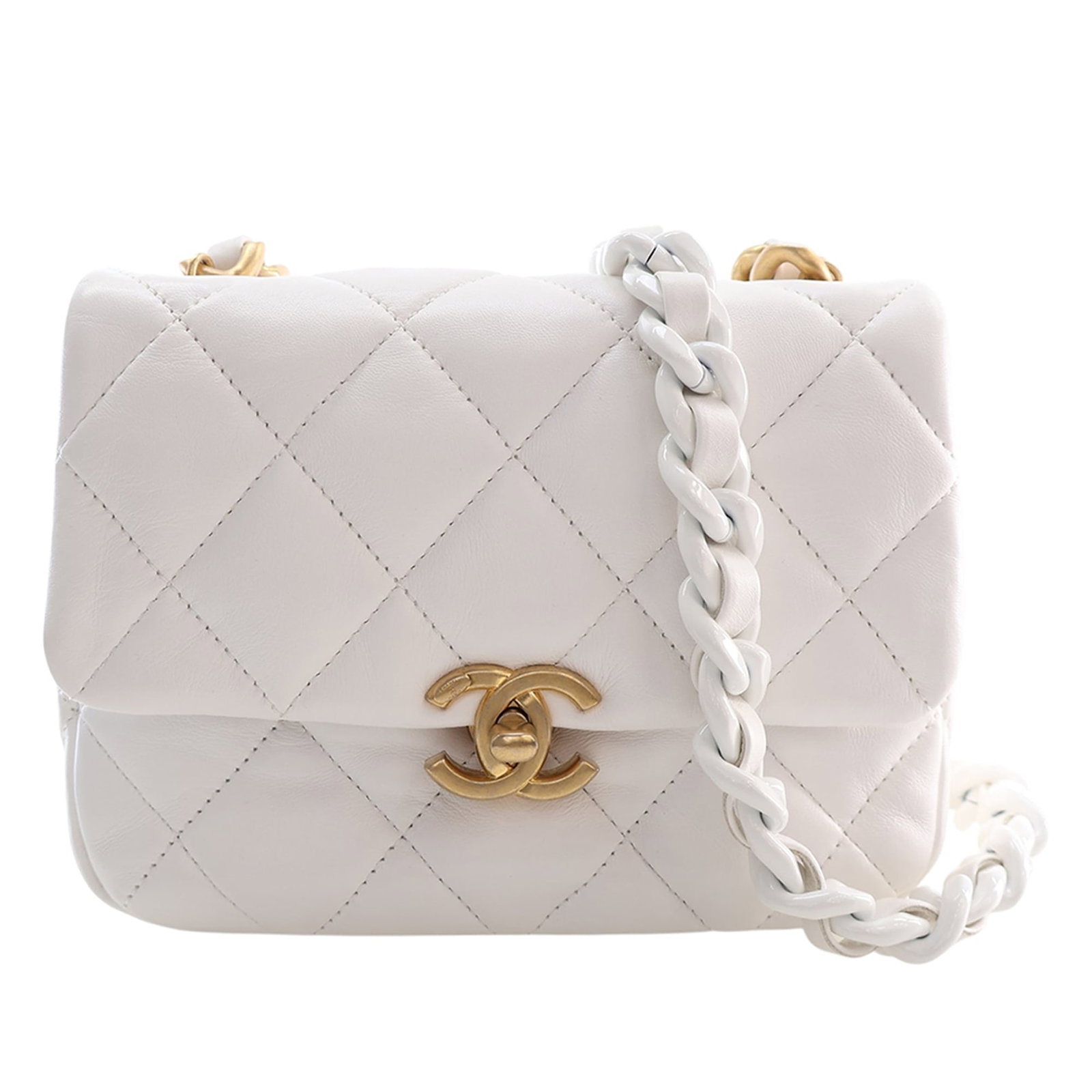 Chanel Candy Chain Mini Flap Crossbody White Quilted Lambskin: Chanel Candy Chain Mini Flap Crossbody White Quilted Lambskin This Chanel Mini Quilted Lambskin Candy Chain Flap is a crossbody bag made from quilted lambskin leather in white. It features a leather-w