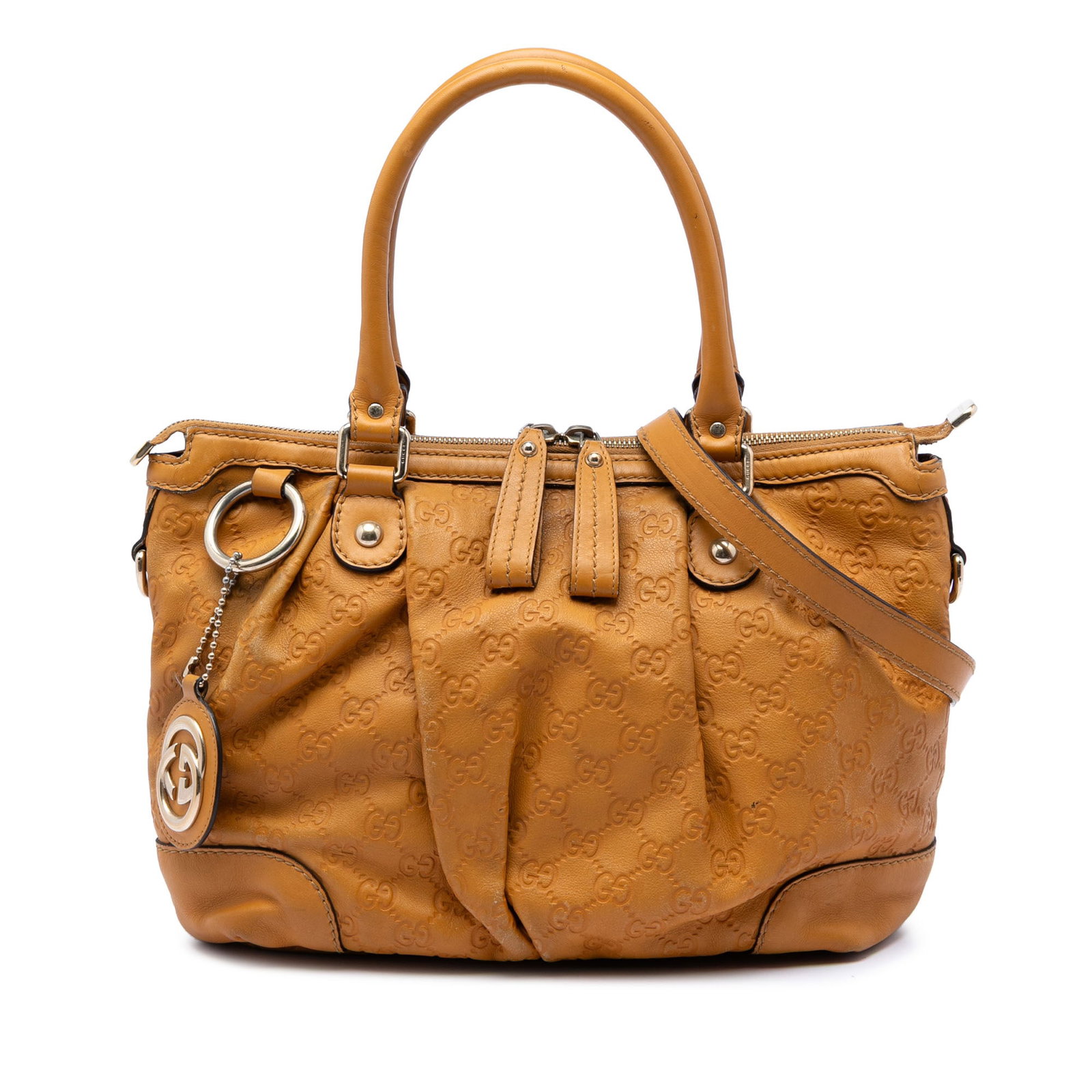 Gucci yellow leather Sukey tote satchel: Gucci yellow leather Sukey tote satchel The Guccissima Sukey Satchel is crafted from yellow leather and features rolled leather handles, an adjustable and detachable flat strap, a top zip closure, and