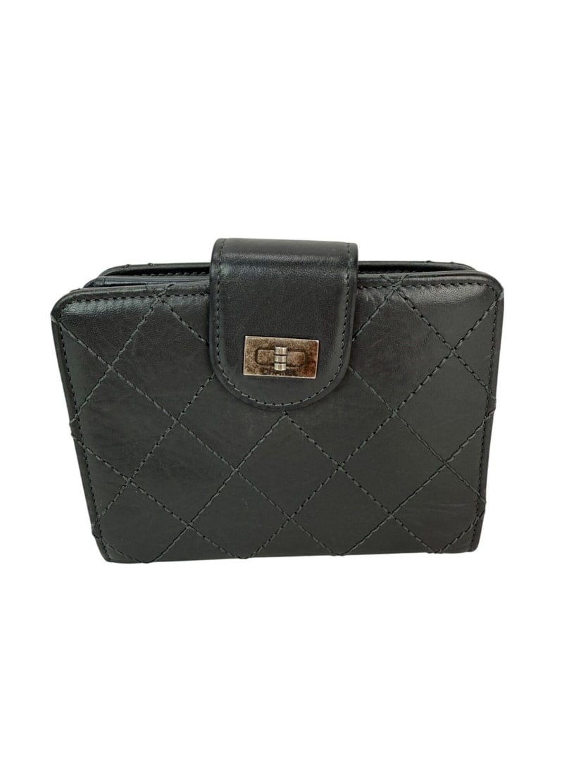 Chanel Gray Aged Calfskin 2.55 Reissue Trifold Wallet: Chanel Gray Aged Calfskin 2.55 Reissue Trifold Wallet This Chanel compact wallet is crafted from aged calfskin leather in a sophisticated gray color. Designed in a trifold style, it features a stylish