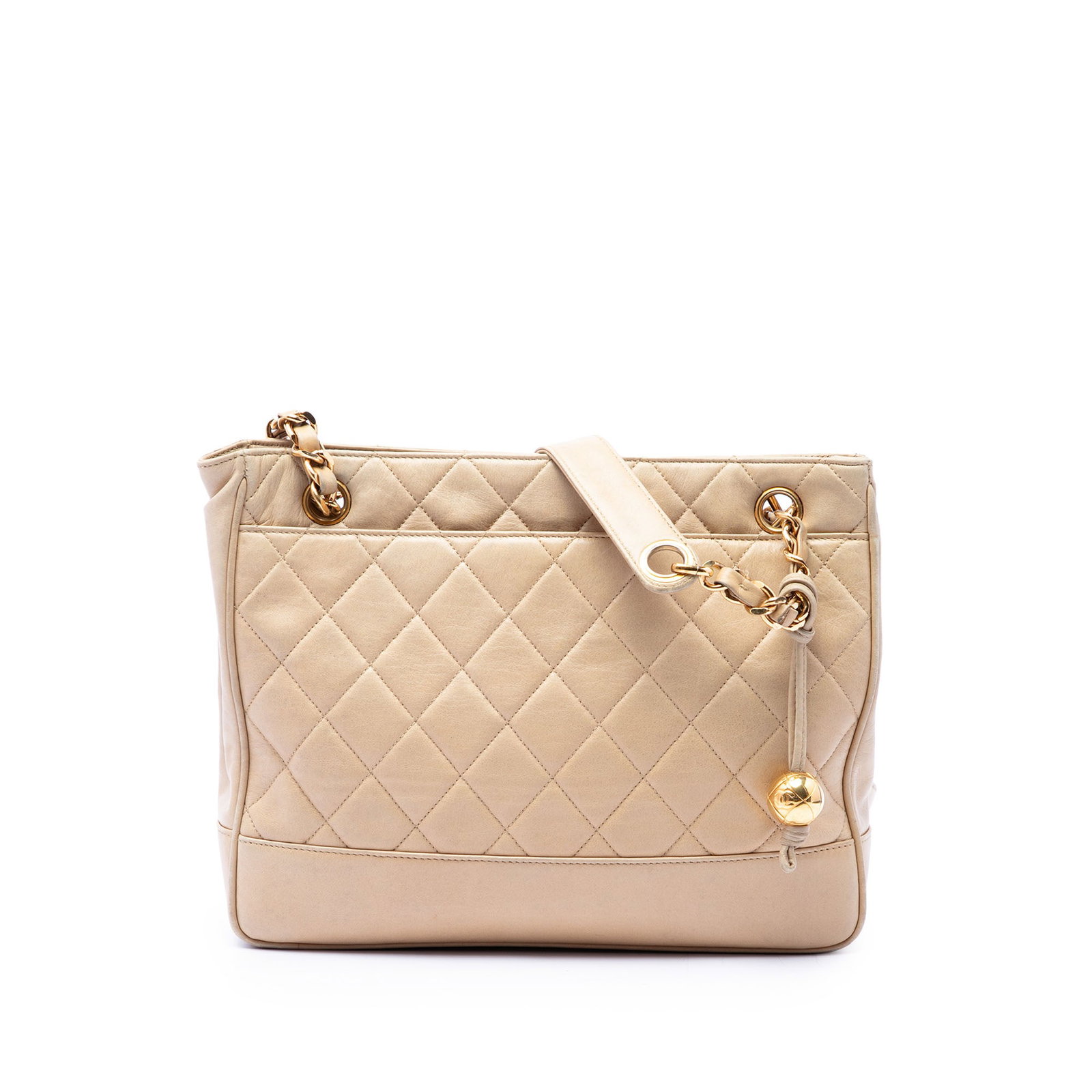 Chanel Coco Ball CC Quilted Lambskin Shoulder Bag Beige: Chanel Coco Ball CC Quilted Lambskin Shoulder Bag Beige A Chanel CC Quilted Lambskin Coco Ball Chain shoulder bag in beige leather. This shoulder bag features a quilted leather body, a leather-woven c