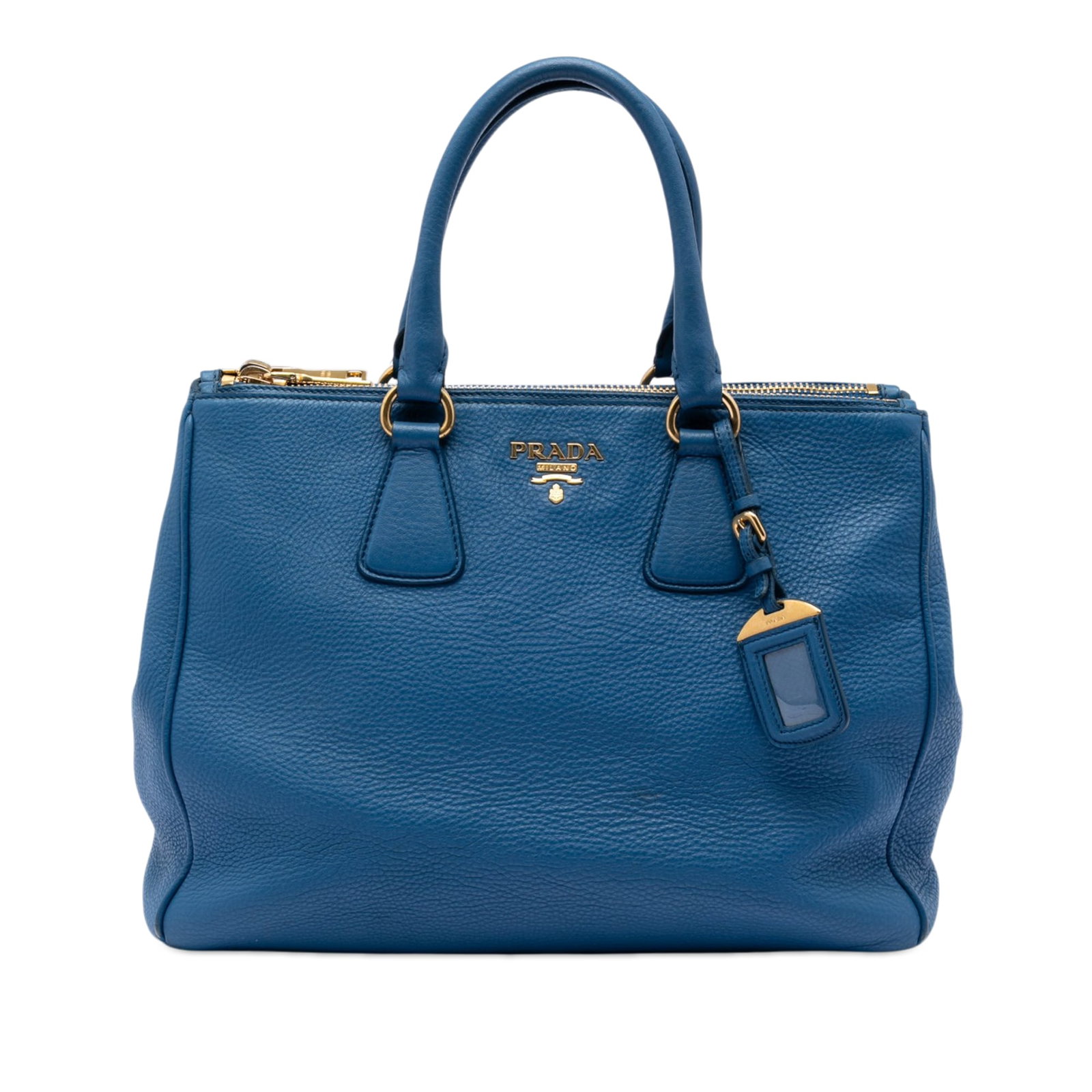 Prada Vitello Daino Leather Convertible Tote Bag: Prada Vitello Daino Leather Convertible Tote Bag This Prada Vitello Daino Double Zip Convertible Tote is crafted from blue leather and features rolled leather handles, an open top with snap closure, t