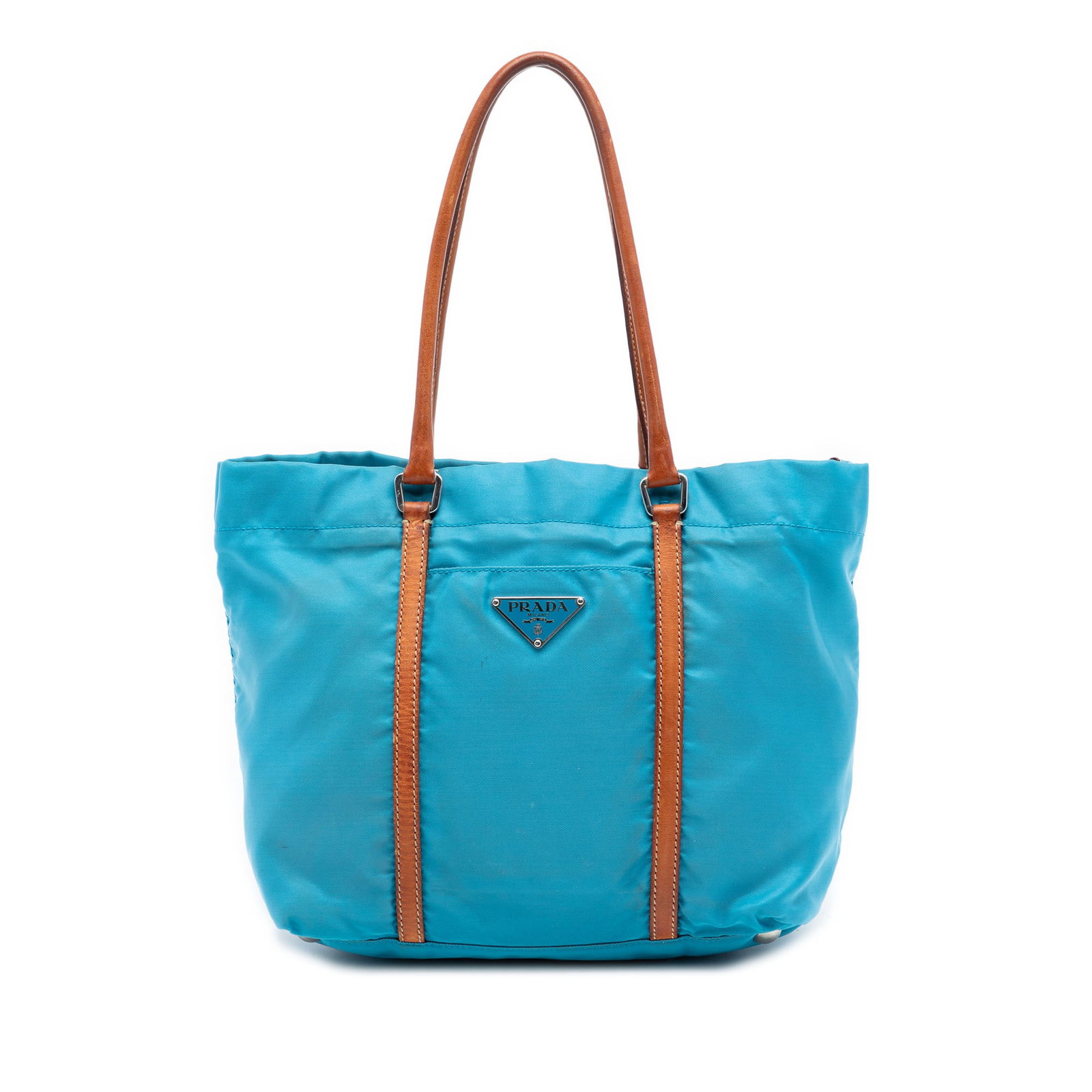 Prada blue nylon tote with leather trim Tessuto: Prada blue nylon tote with leather trim Tessuto This Prada Tessuto Tote features a blue nylon body with leather trim and flat leather straps. The bag has an open top with a hook closure and includes a