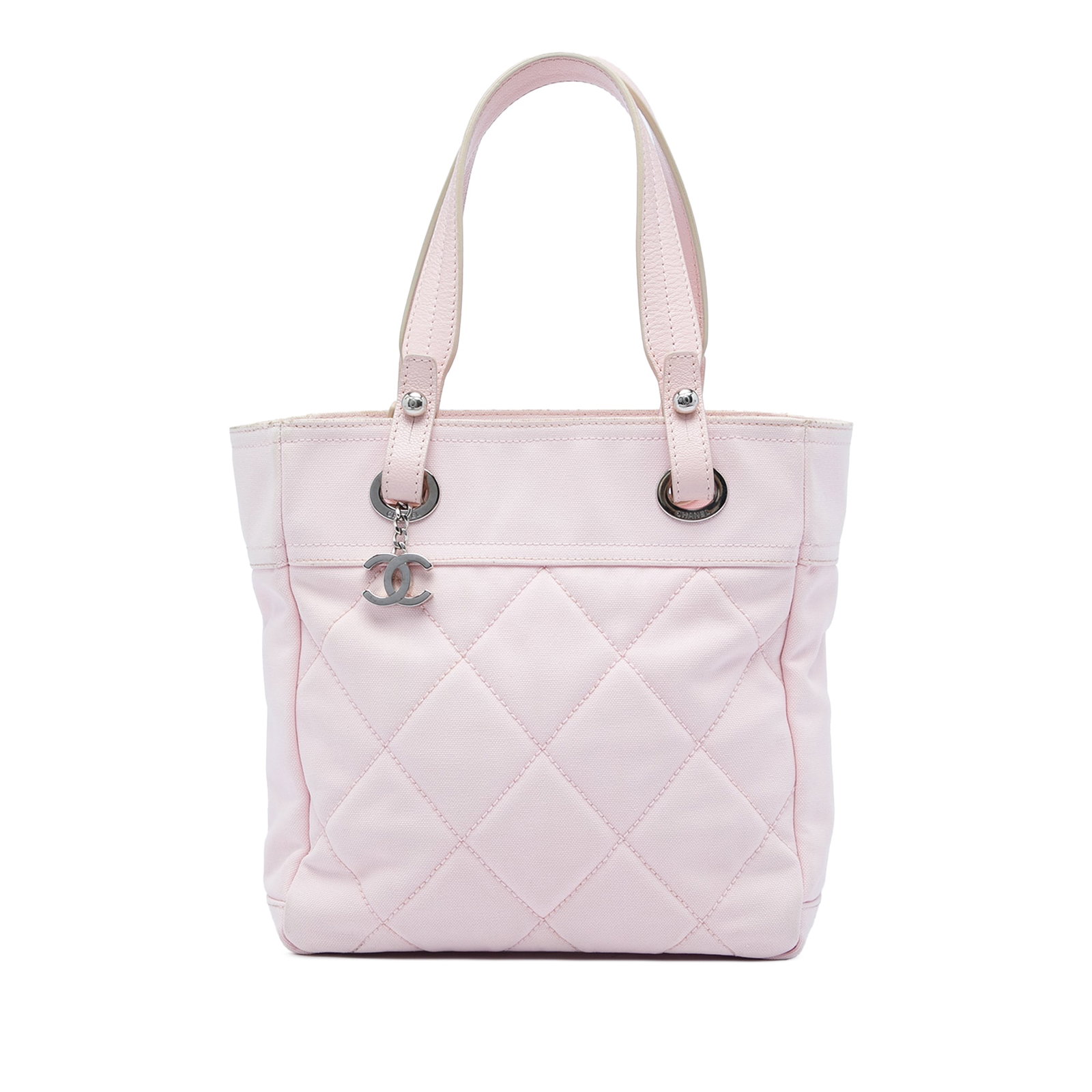 Chanel Paris Biarritz Small Quilted Canvas Tote Pink: Chanel Paris Biarritz Small Quilted Canvas Tote Pink Chanel Small Quilted Canvas Paris Biarritz Tote in pink with a quilted fabric body, flat leather handles, a top zip closure, and interior zip and s