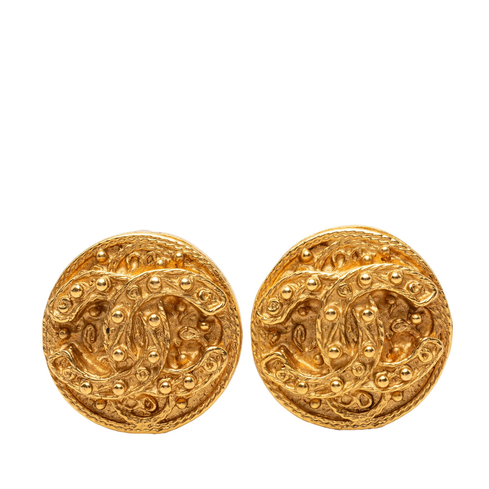Chanel CC Round Clip On Earrings Gold Plated Metal: Chanel CC Round Clip On Earrings Gold Plated Metal Round Chanel CC clip-on earrings in gold plated metal. This costume jewelry pair is made in France and features the iconic CC design. Condition is AB