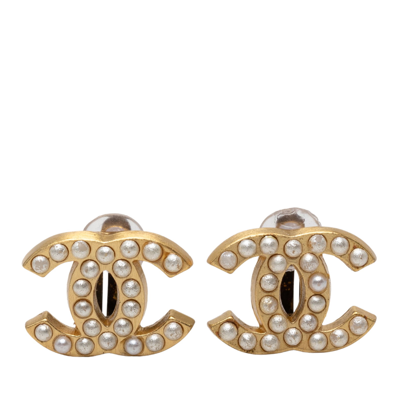 Chanel CC Faux Pearl Gold Plated Clip Earrings: Chanel CC Faux Pearl Gold Plated Clip Earrings Chanel clip-on earrings featuring the CC motif with a gold plated body and faux pearl accents. Made in France, this costume jewelry pair shows visible we
