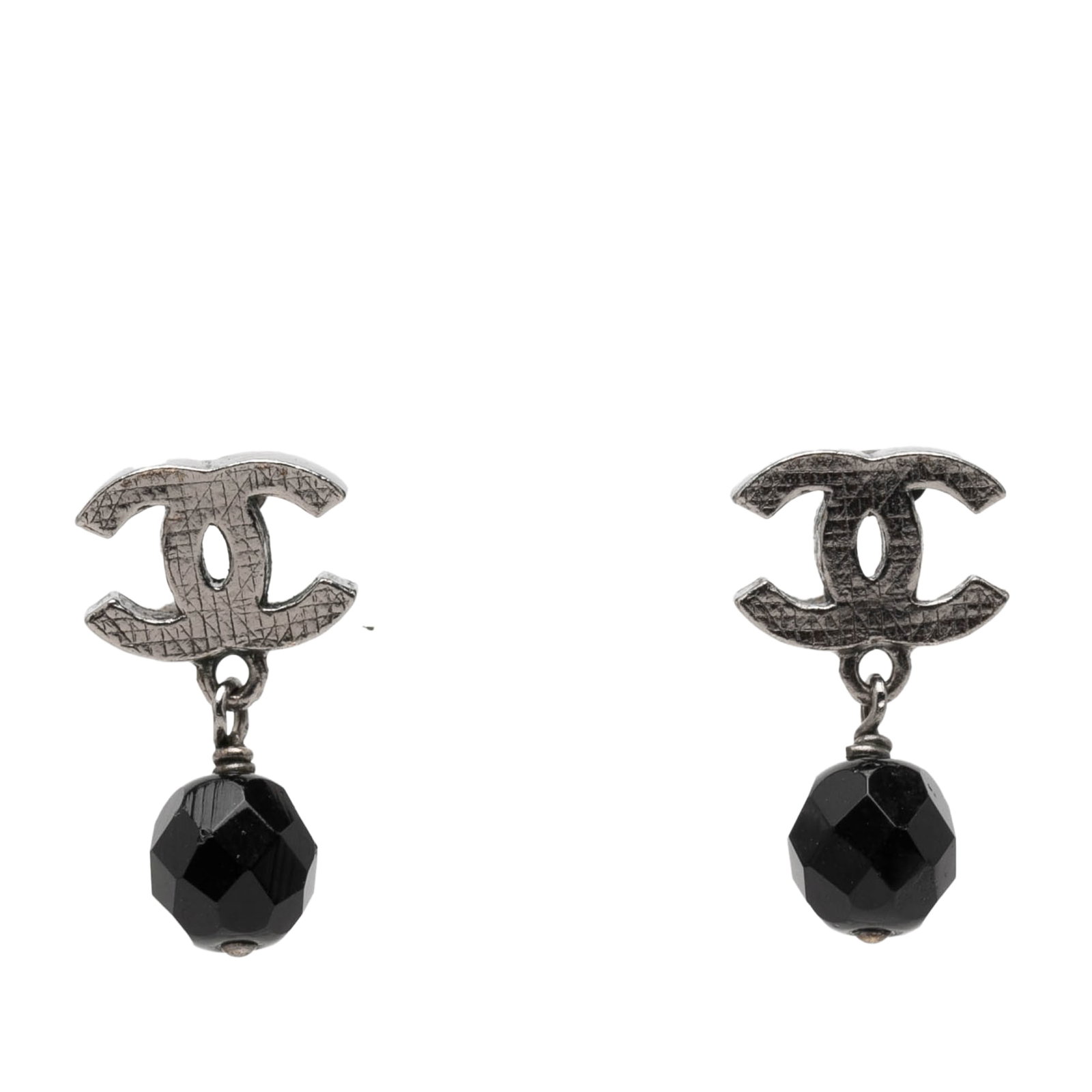 Chanel CC silver plated beaded swing earrings push back: Chanel CC silver plated beaded swing earrings push back These Chanel earrings feature a silver plated metal construction with intricate bead detailing and secure push back closures. Designed in a swin