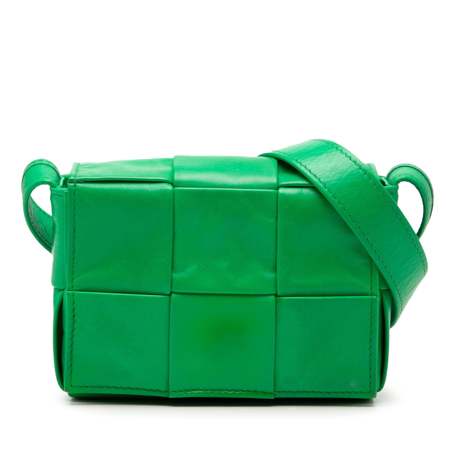 Bottega Veneta Intrecciato Cassette Candy Nappa Leather Crossbody Bag: Bottega Veneta Intrecciato Cassette Candy Nappa Leather Crossbody Bag Bottega Veneta Candy Nappa Intrecciato Cassette Crossbody bag in green leather, made in Italy. It features a woven nappa leather b