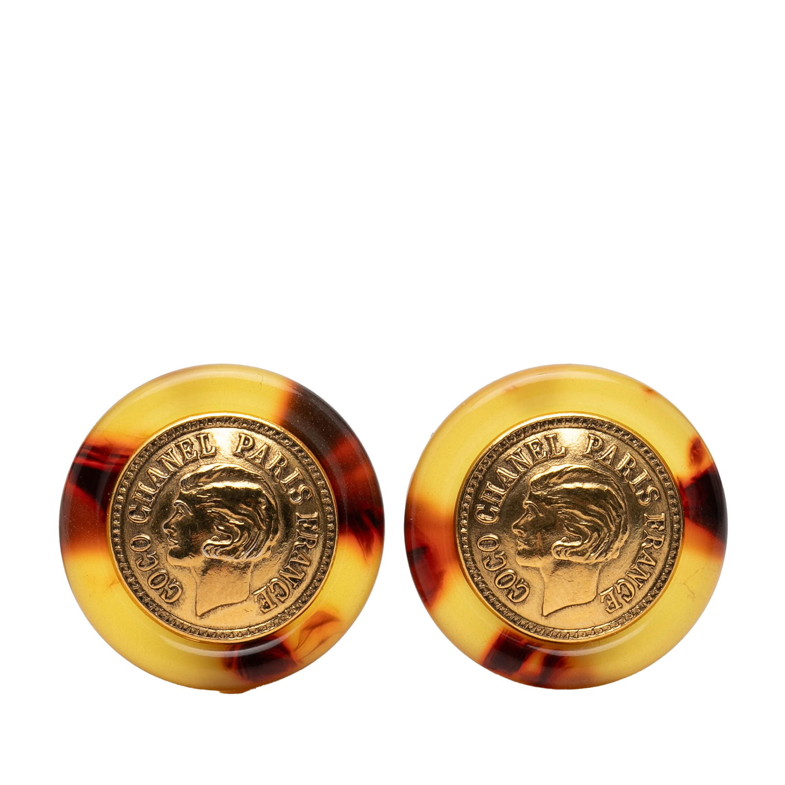 Chanel tortoiseshell acetate coin clip-on earrings gold-tone: Chanel tortoiseshell acetate coin clip-on earrings gold-tone These Chanel clip-on earrings feature a combination of tortoiseshell acetate and gold-tone metal, designed in a coin motif. Made in France,